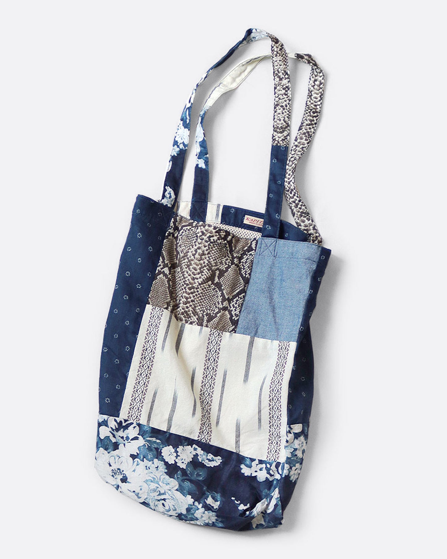 A patchwork tote bag shown from the front.