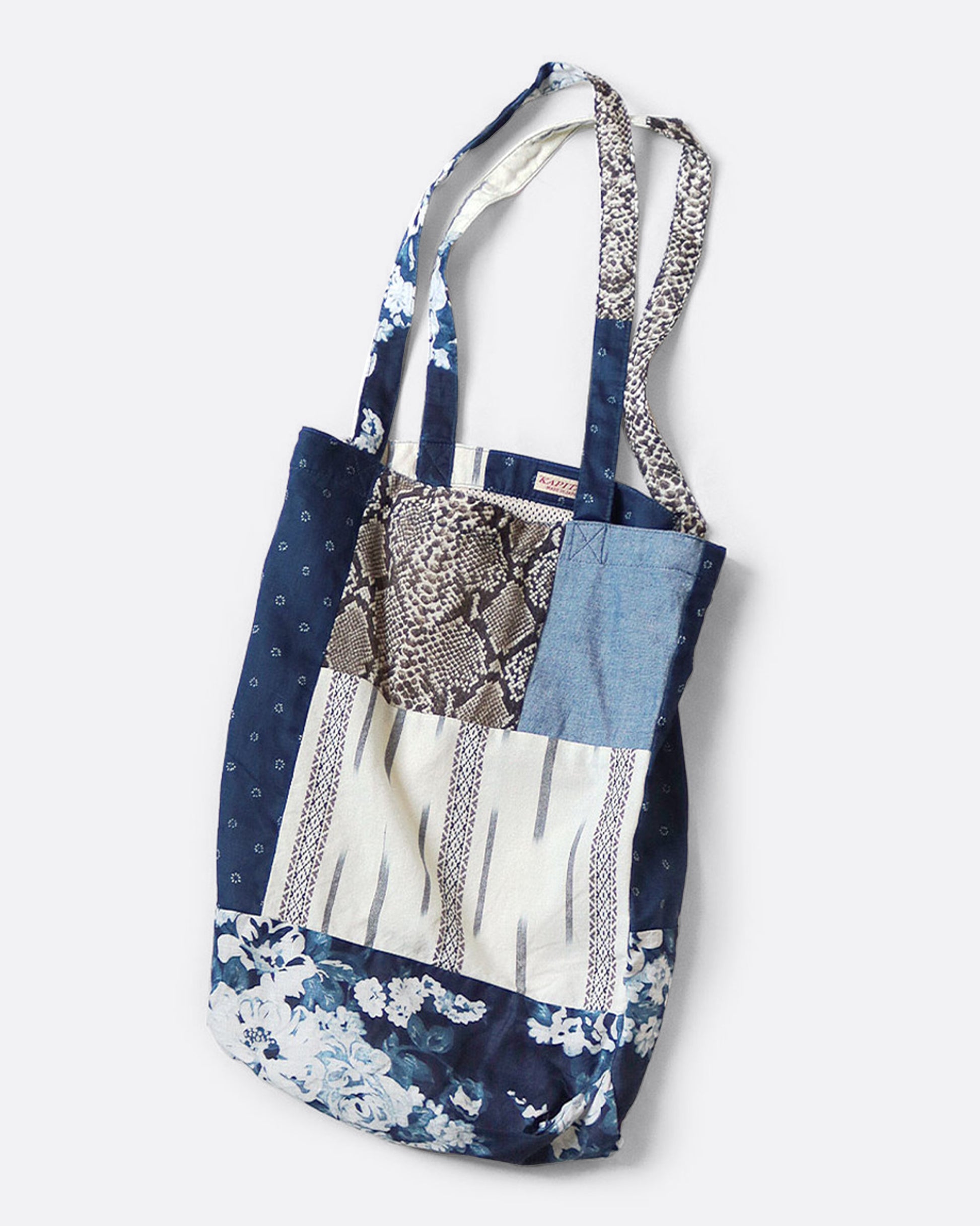 A patchwork tote bag shown from the front.