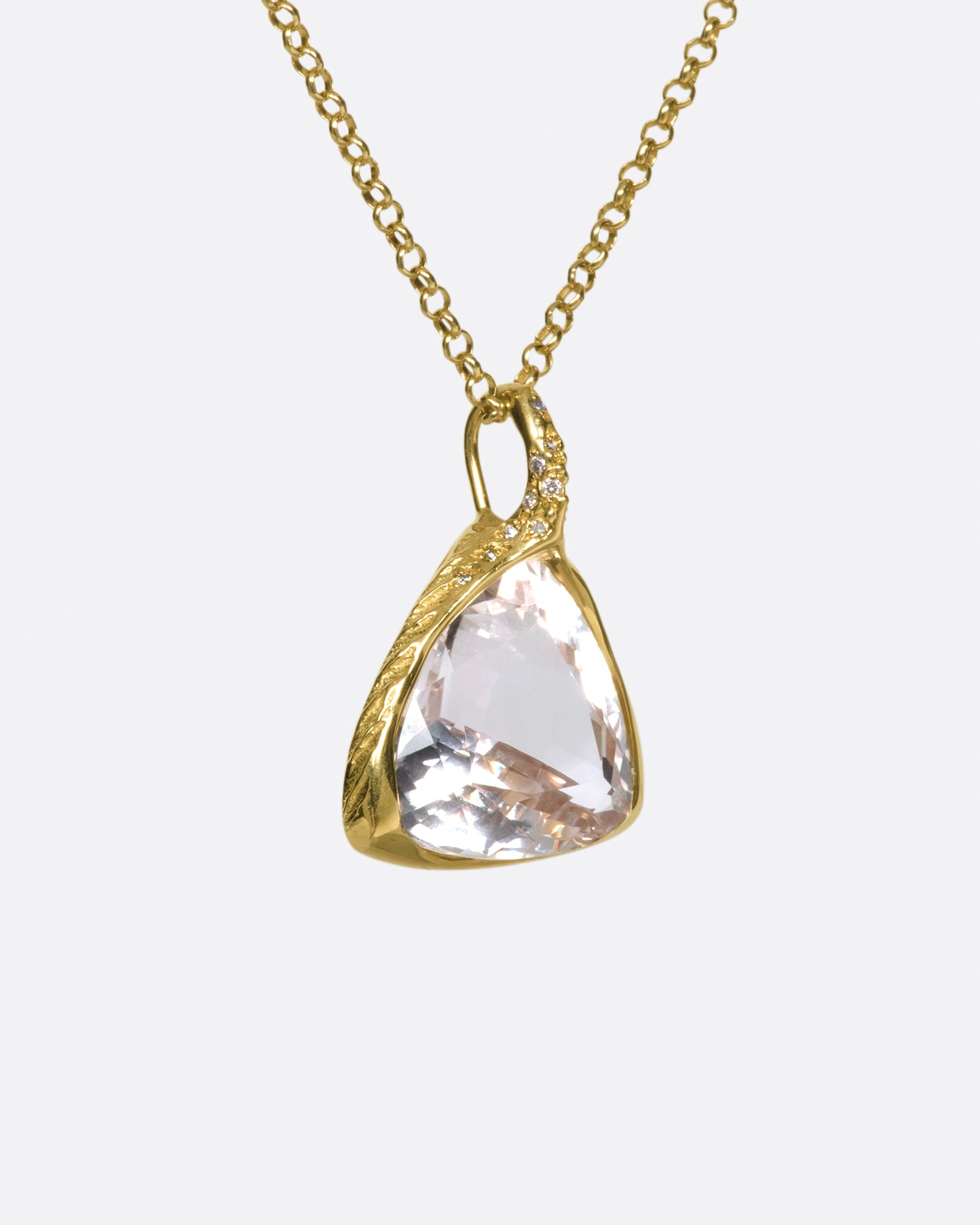 This stone pendant is nothing short of spectacular, but the added diamond accents around the setting don't hurt.