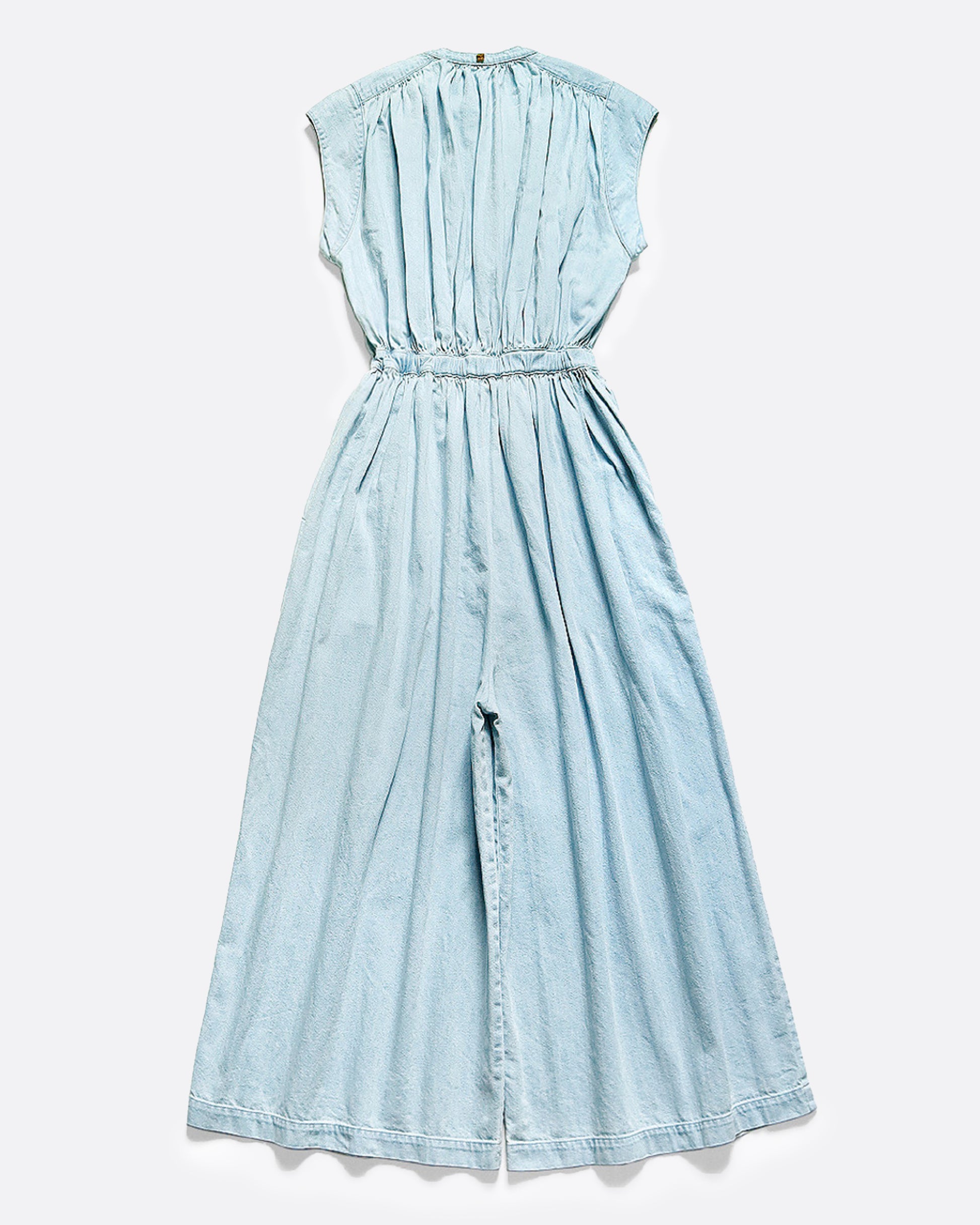 Sleeveless chambray jumpsuit with gathered waist, ruched bust and wide legs. View from the back.