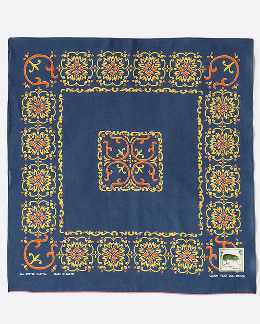 A navy bandana with naja motif.