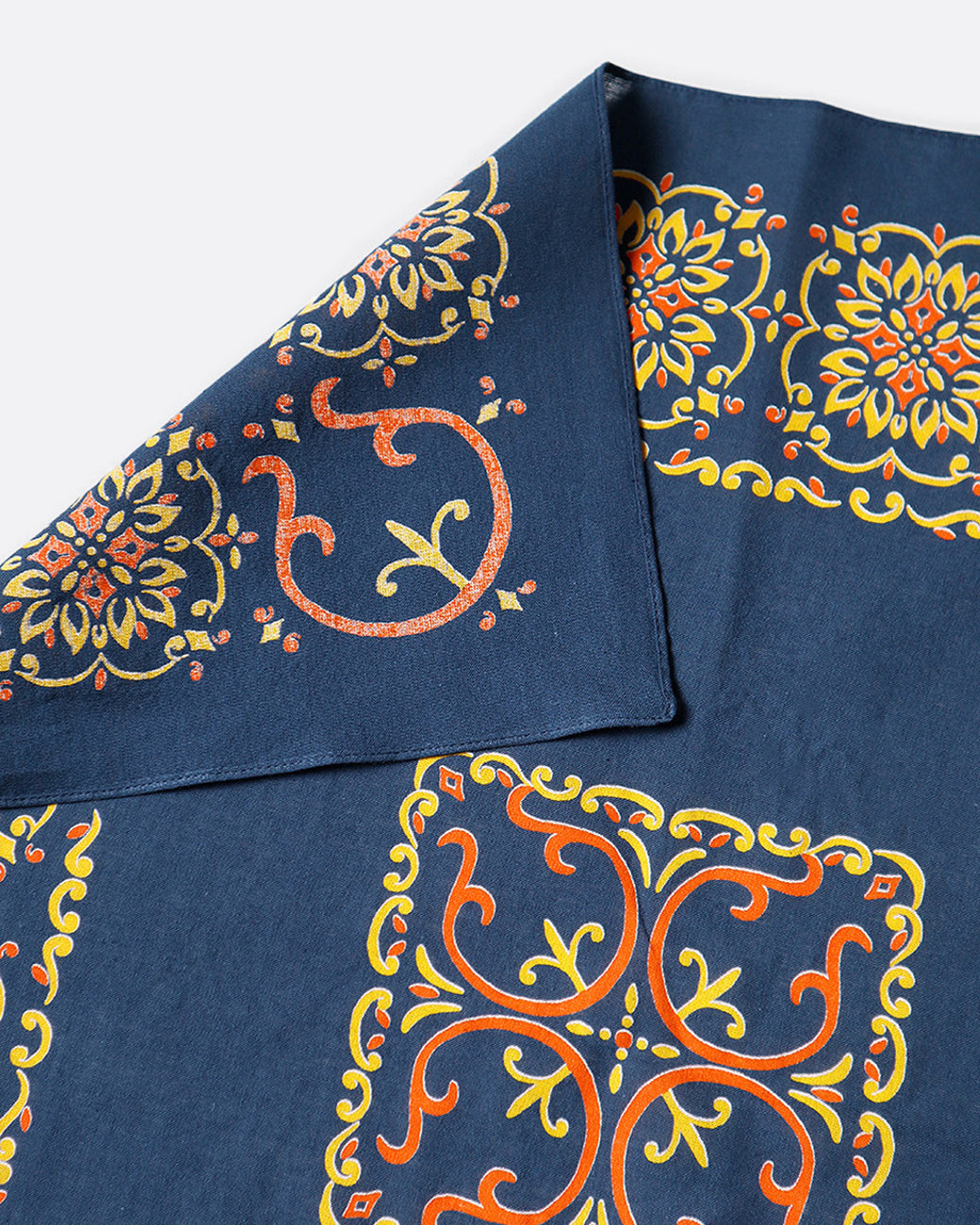 A navy bandana with naja motif.