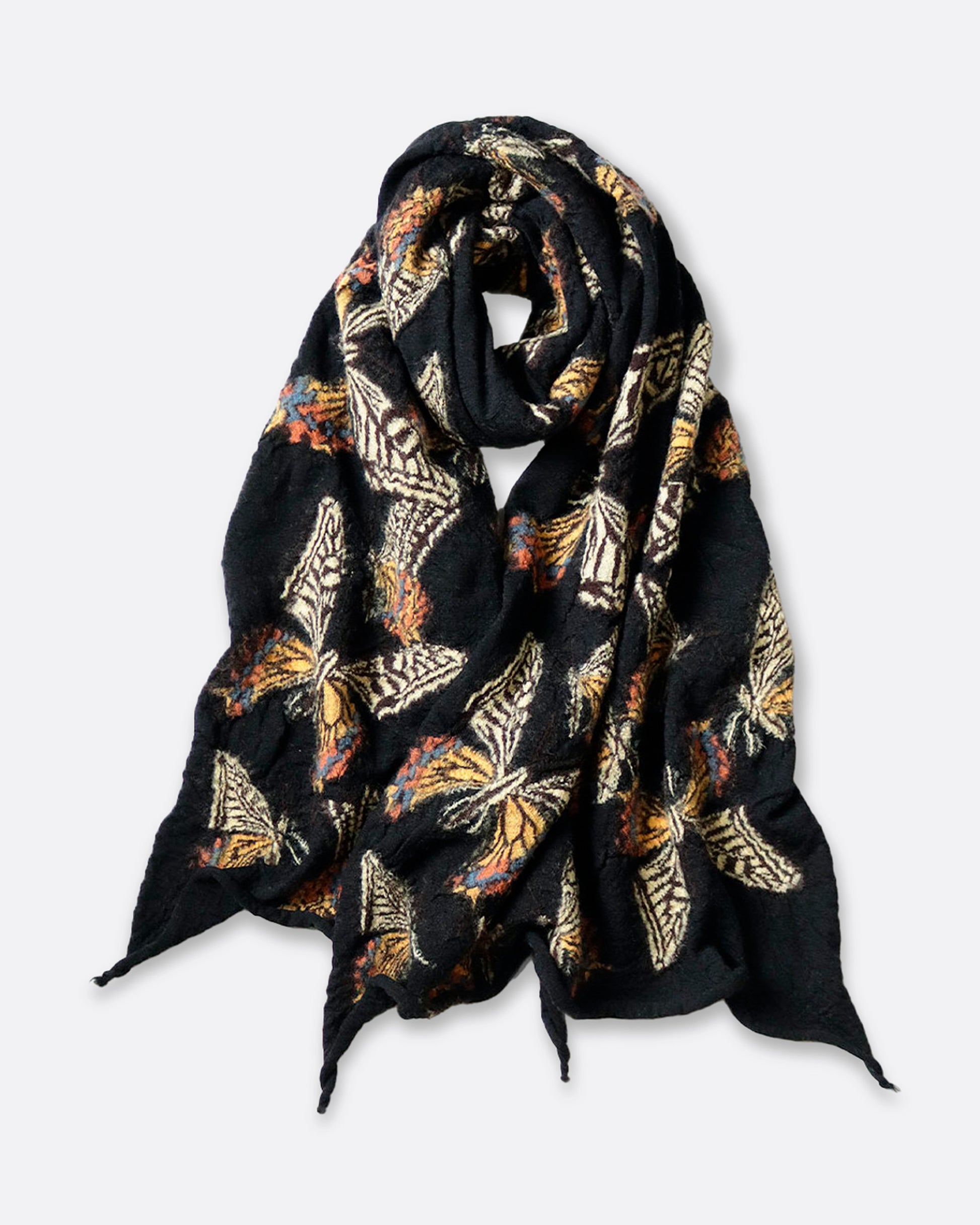 A black compressed wool scarf with butterflies all over it, shown looped.