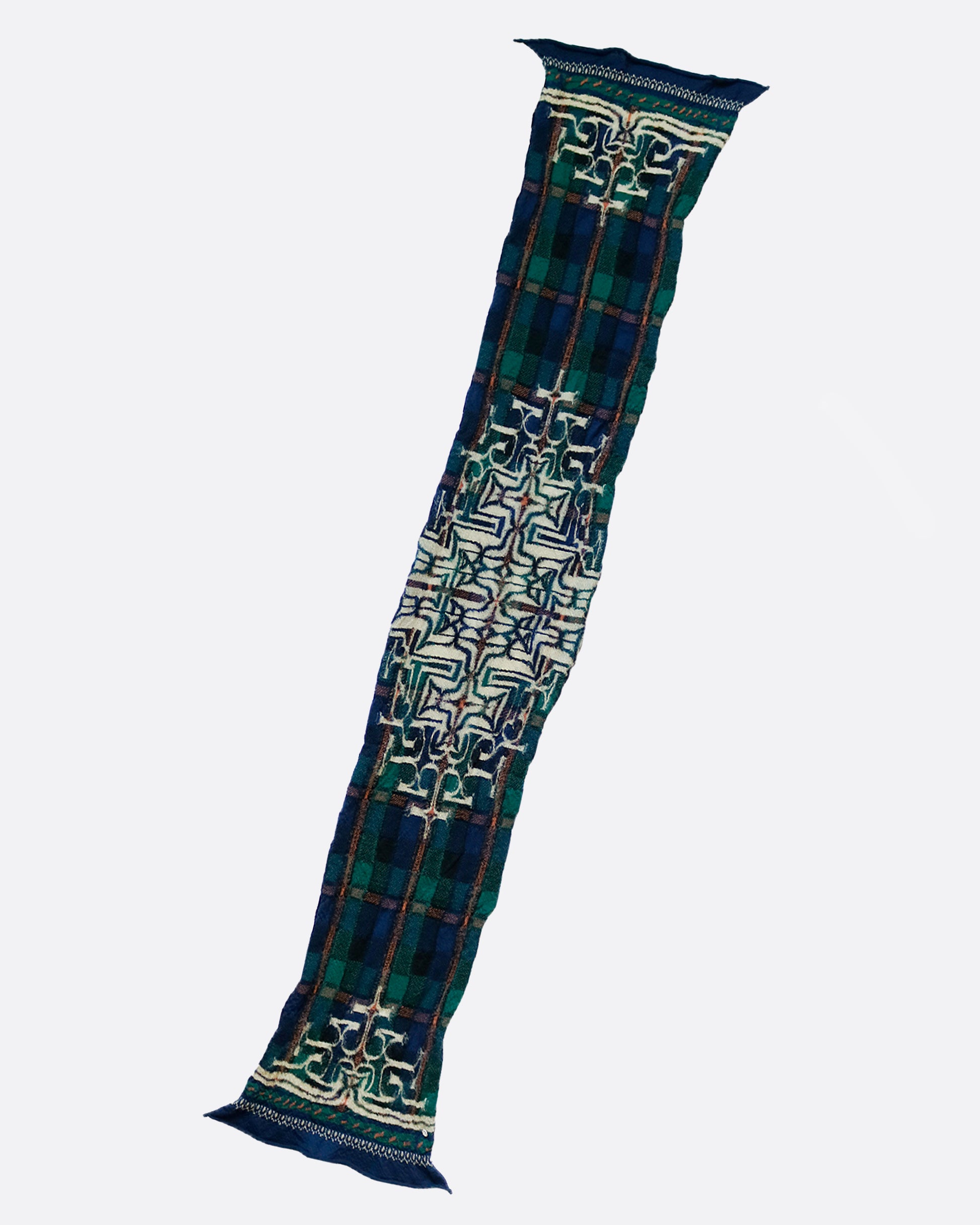 This scarf combines traditional Scottish tartan and Japanese Ainu patterns.