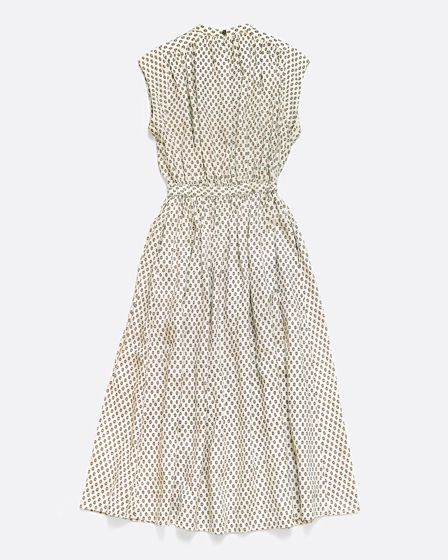 A sleeveless dress with a small ethnic pattern. It has a clean neckline with gathers across the bust and an elastic waist. View from the back.