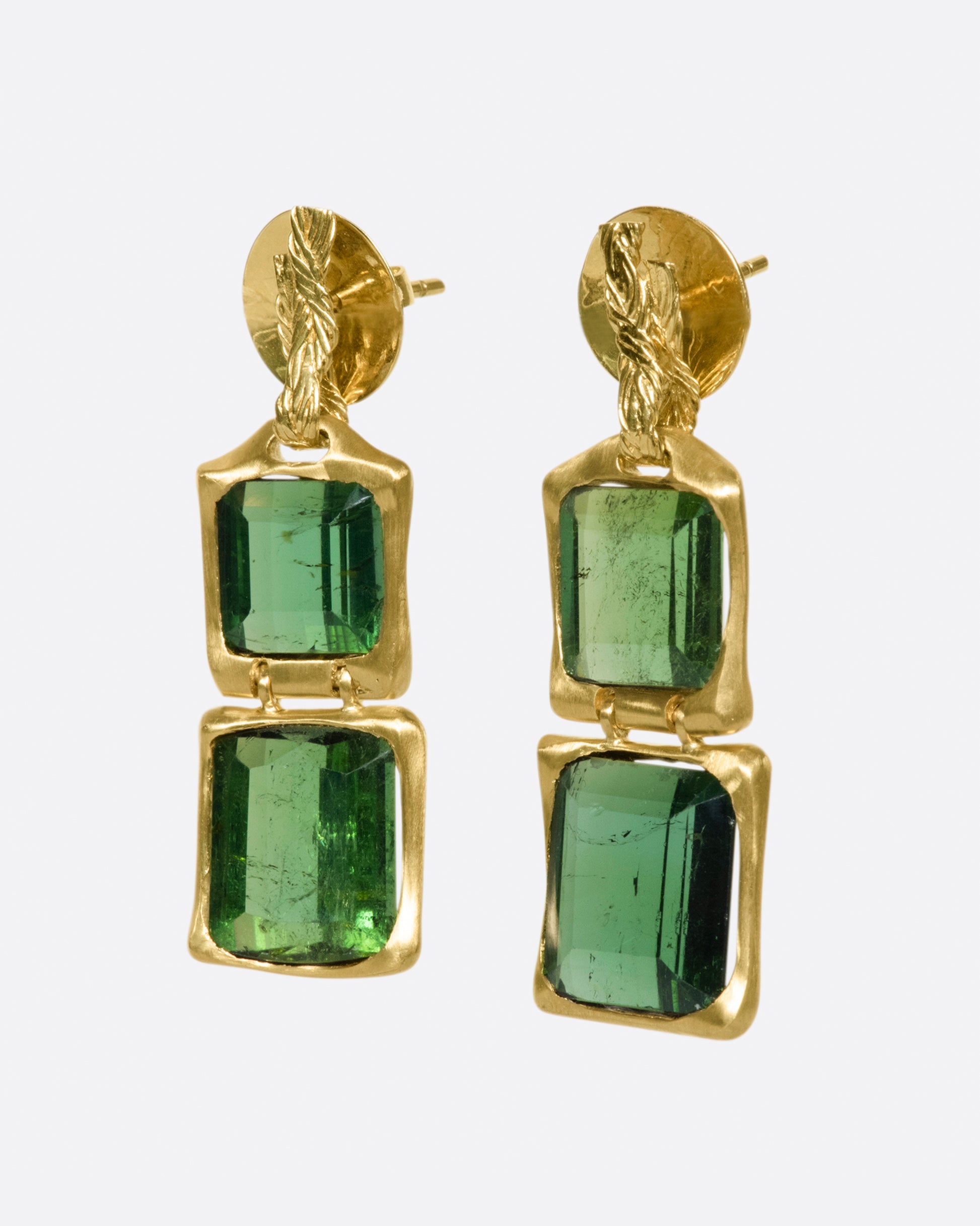 These deep green earrings are hinged between the two tourmalines, giving them some great movement and swing.