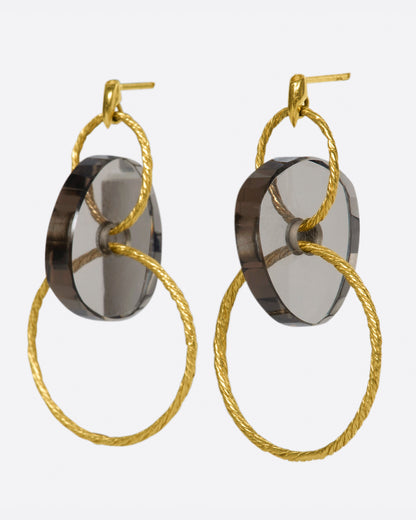 Yellow gold and smoky quartz hoop earrings, angled view of the earrings showing the round smoky quartz discs