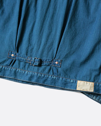 Indigo gauze jacket, close view of the back hem and label
