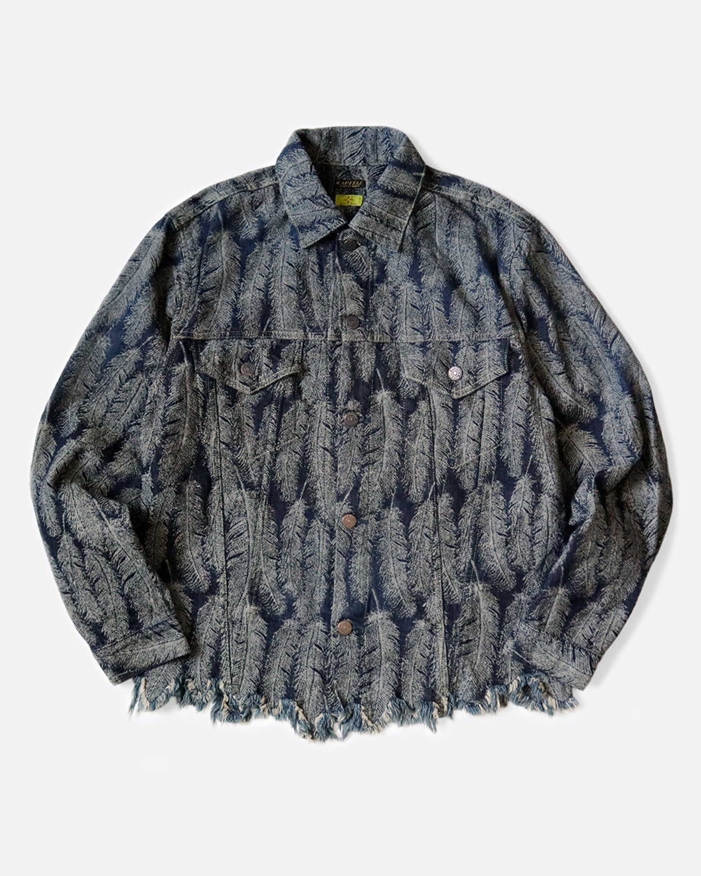 A Type III jacket made from denim jacquard with a 3D luxurious feather pattern and a fringy hem.