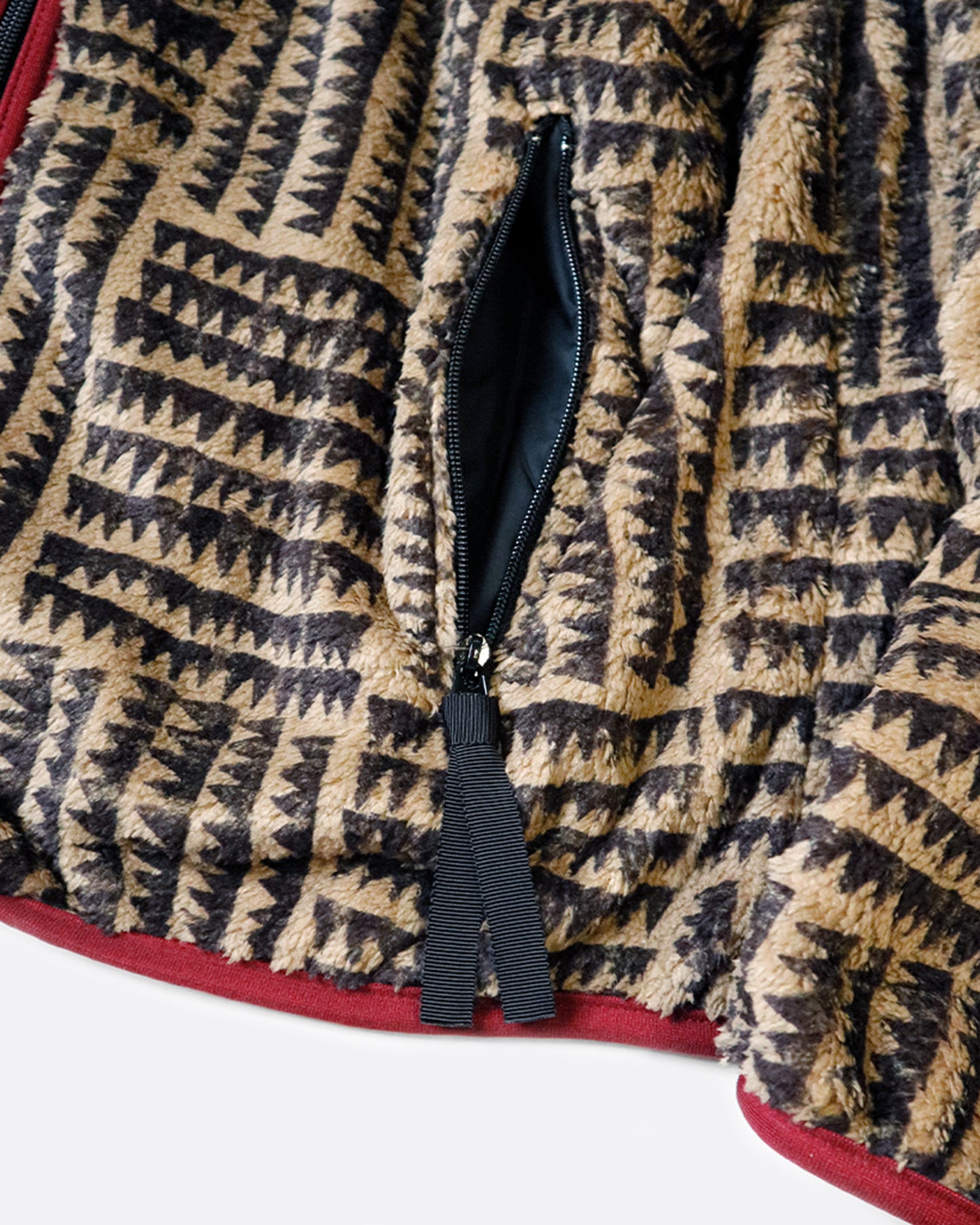 A fan favorite jacket, this time in a geometric sawtooth block pattern.