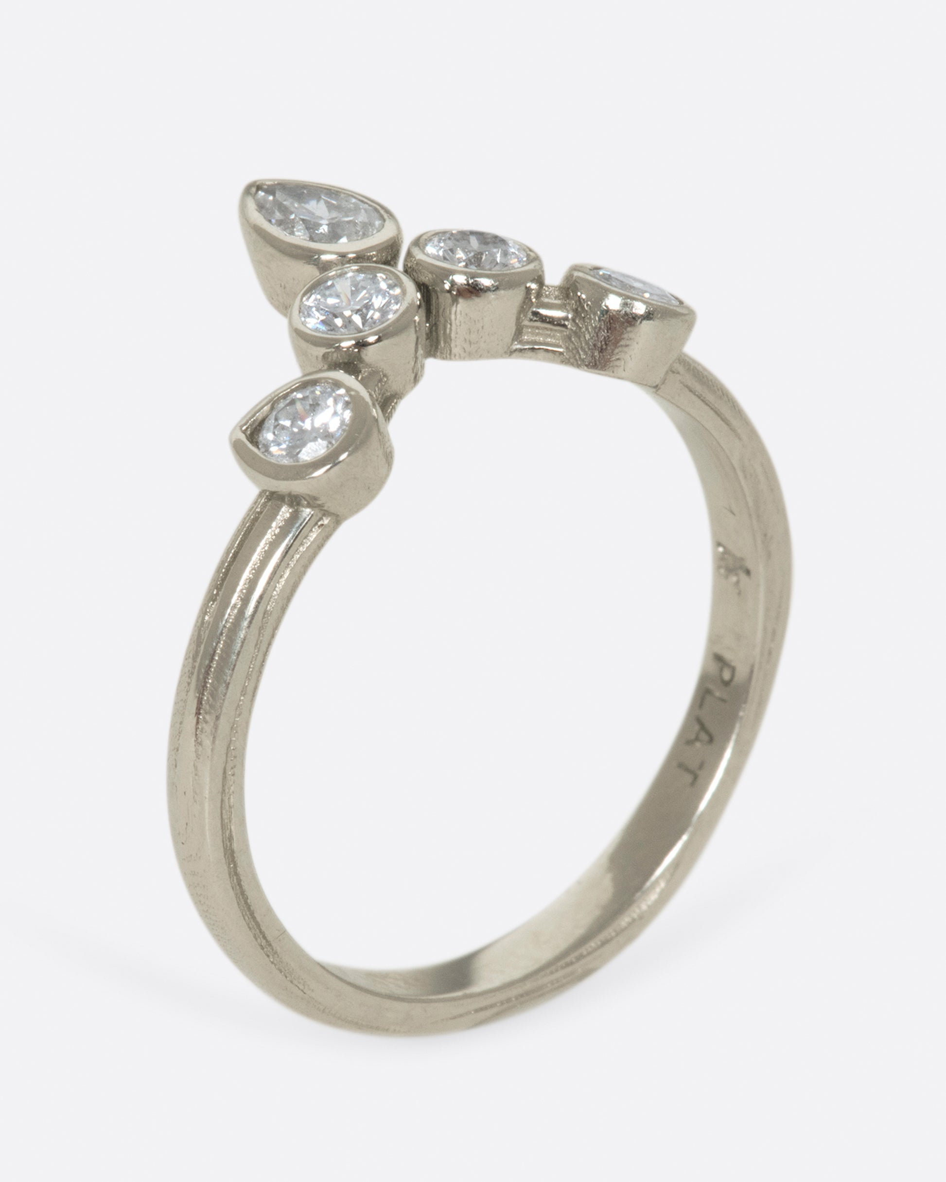 This crowning design can be worn in either direction on the finger, alone, or stacked with another one of Karen's creations - We love it with one of her Invincible Heart rings