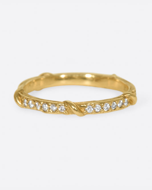 Studded halfway around with diamonds, this band is a twist on a classic with an organic edge.