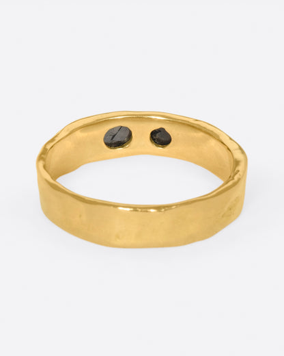Yellow gold black diamond band, back view of the band showing the diamonds from inside