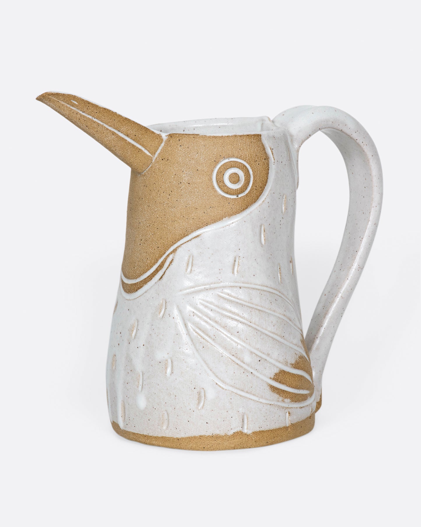 A friendly pitcher that is equally as happy serving your favorite drink as it is holding a bouquet of flowers.