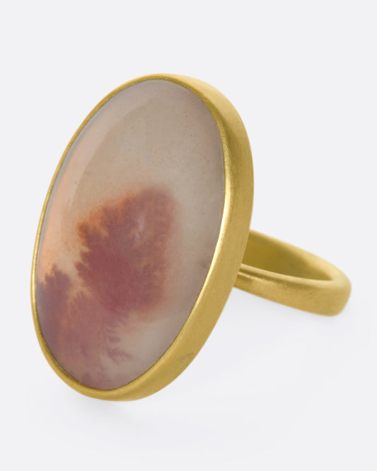 A 14k gold oval dendritic agate quartz ring