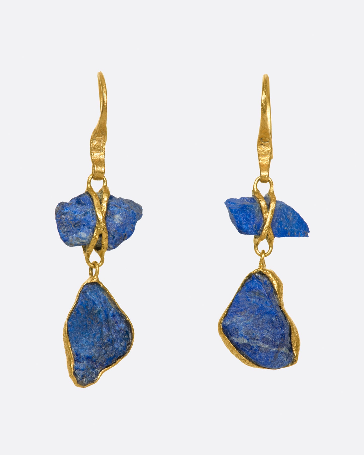 Vibrant, raw, Afghan lapis pebbles wrapped in high karat gold.