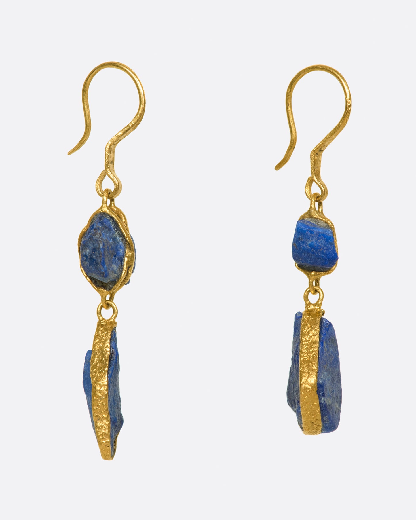 Vibrant, raw, Afghan lapis pebbles wrapped in high karat gold.