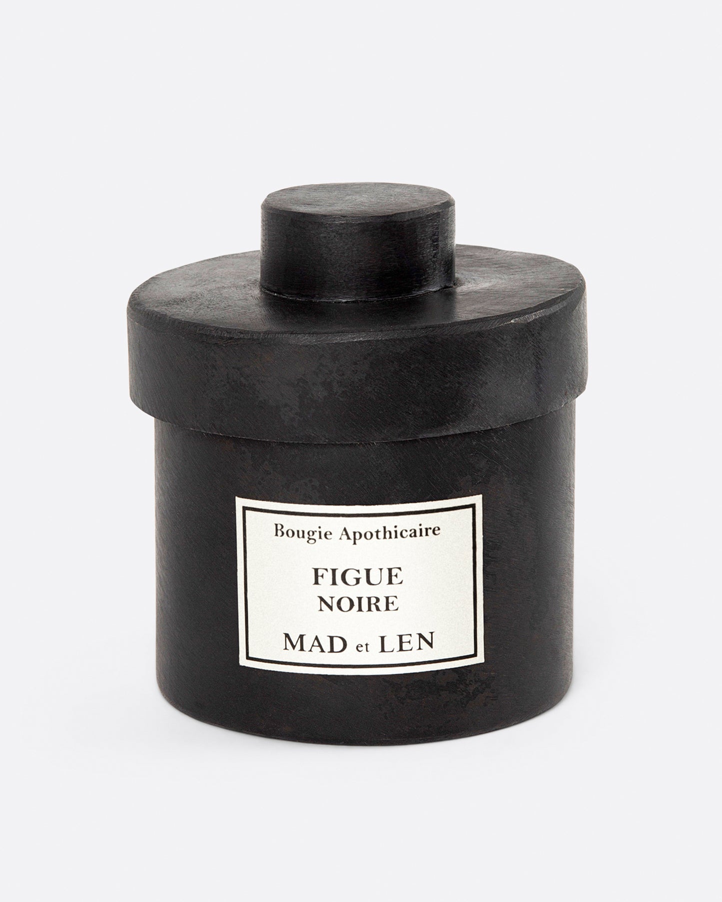 Mad et Len Figue Noire candle, shown from the front.