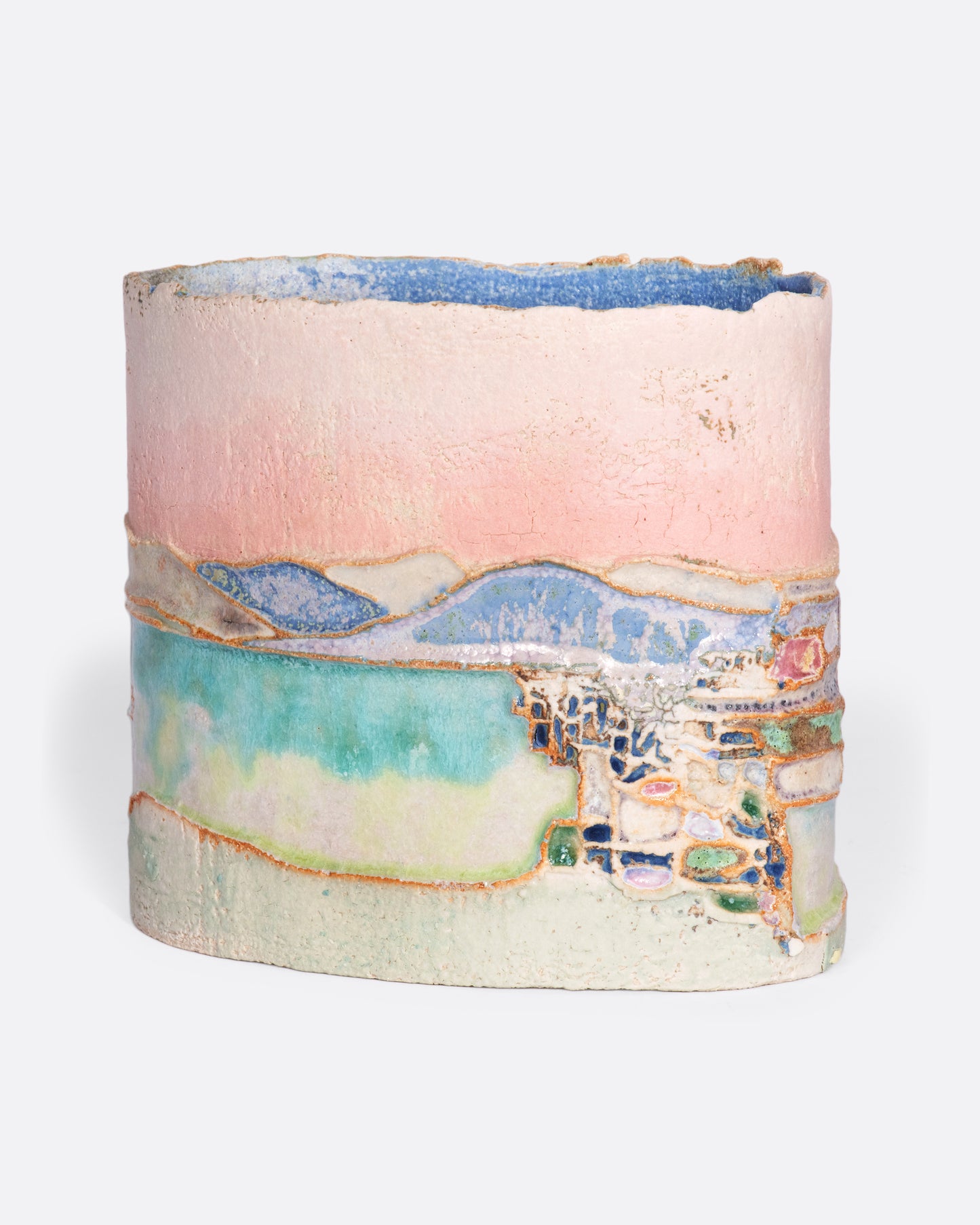 This ceramic vessel is meticulously handmade with many layers of glaze atop stoneware clay, creating a rich, varied texture. A truly special piece that transports you to golden hour in southern France