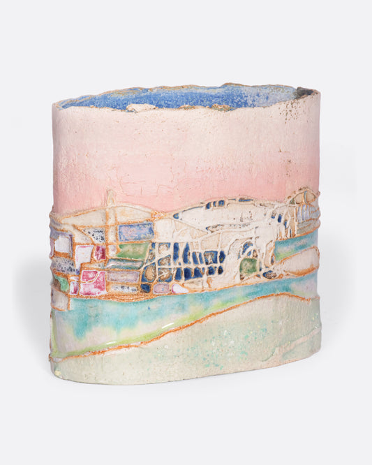 This ceramic vessel is meticulously handmade with many layers of glaze atop stoneware clay, creating a rich, varied texture. A truly special piece that transports you to golden hour in southern France