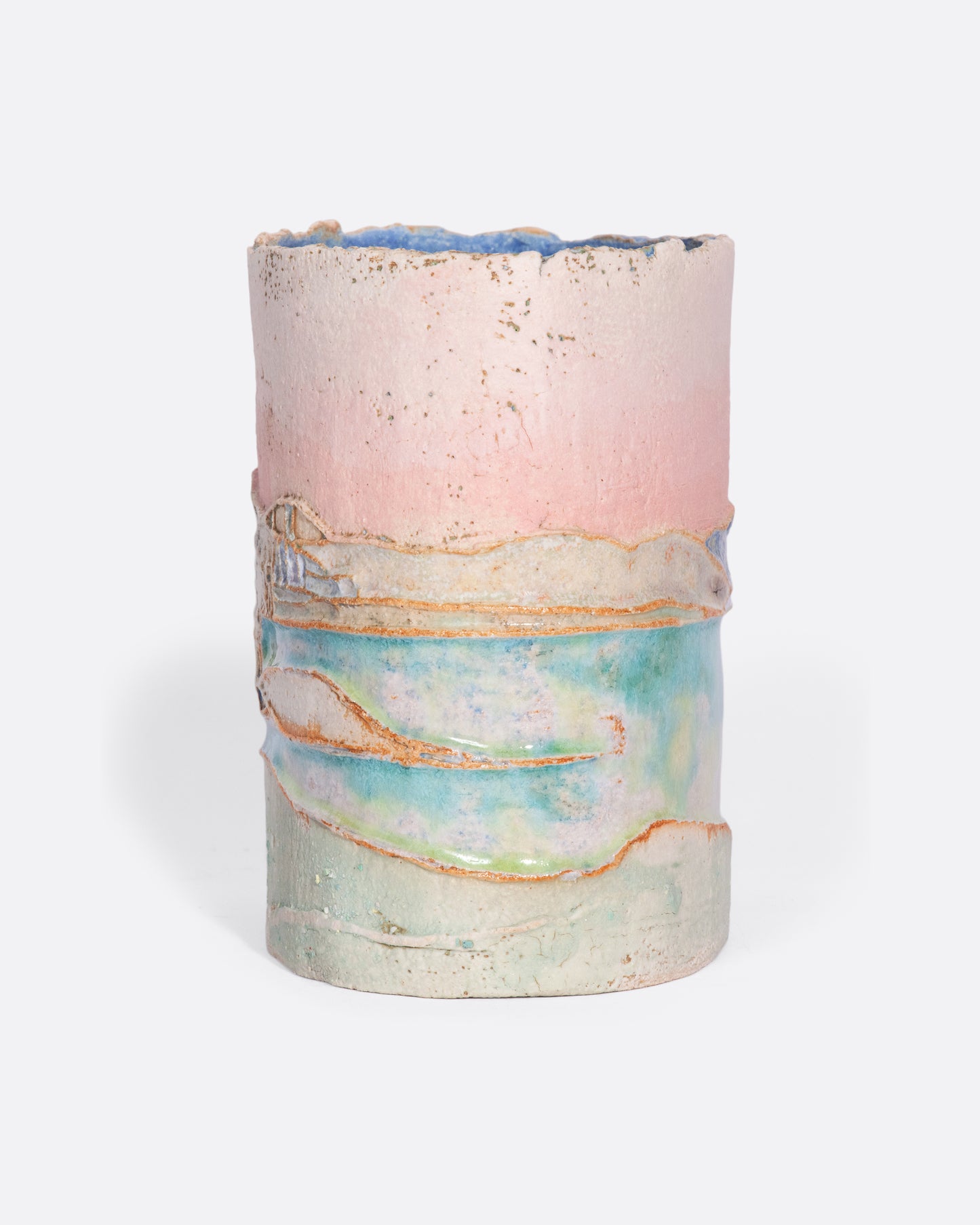 This ceramic vessel is meticulously handmade with many layers of glaze atop stoneware clay, creating a rich, varied texture. A truly special piece that transports you to golden hour in southern France