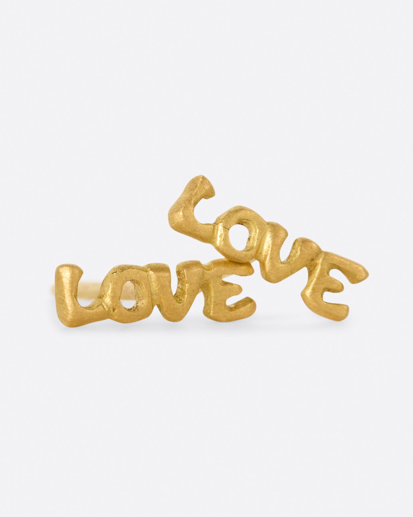 A pair of simple and sweet gold earrings. The word LOVE is spelt out, making these a great gift for your sweetheart.