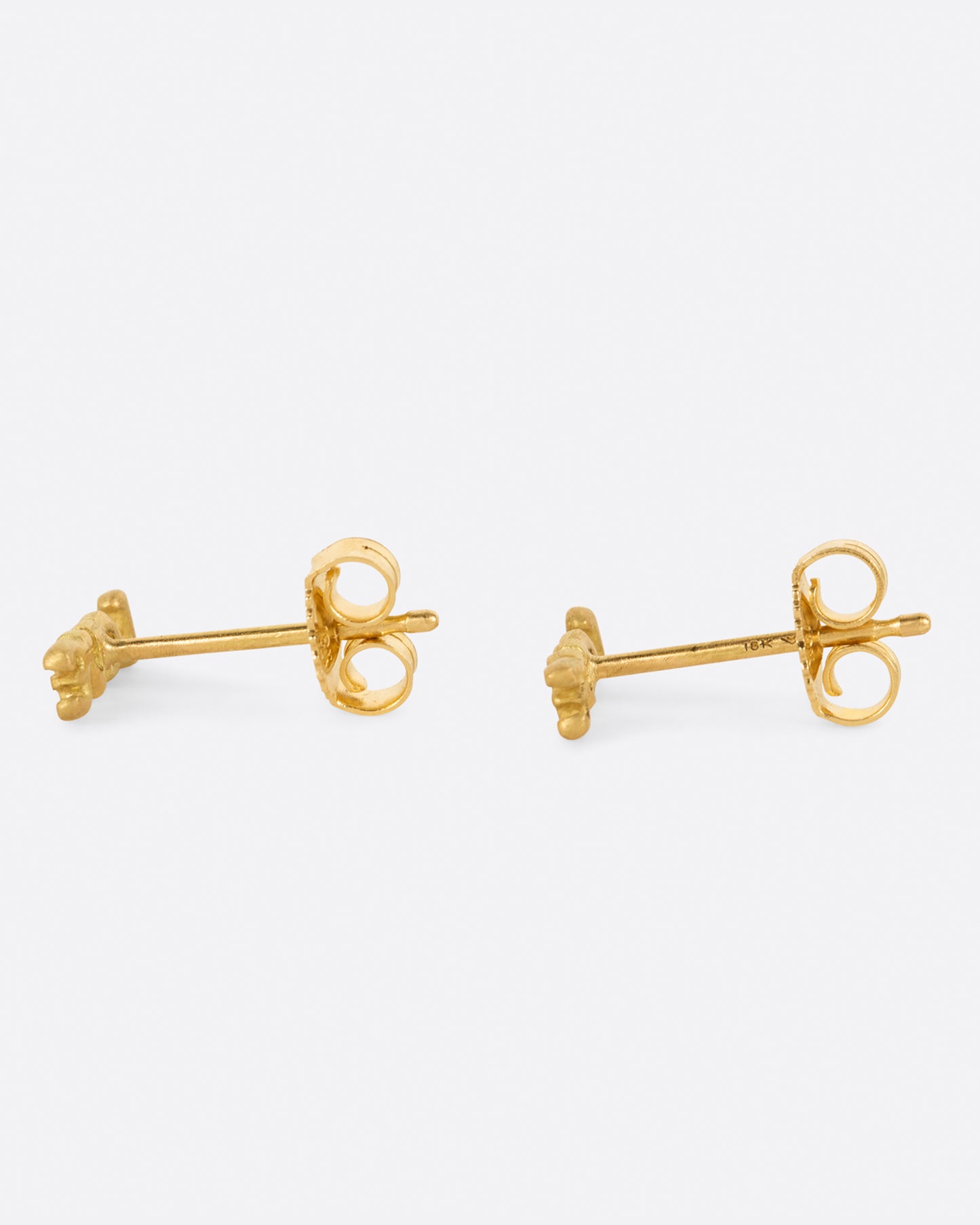 A pair of simple and sweet gold earrings. The word LOVE is spelt out, making these a great gift for your sweetheart.