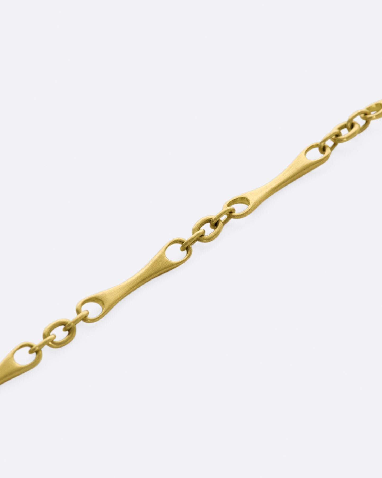 Every link, loop, and even the clasp on this bracelet are handmade. With a nice weight, it's perfect for everyday wear.