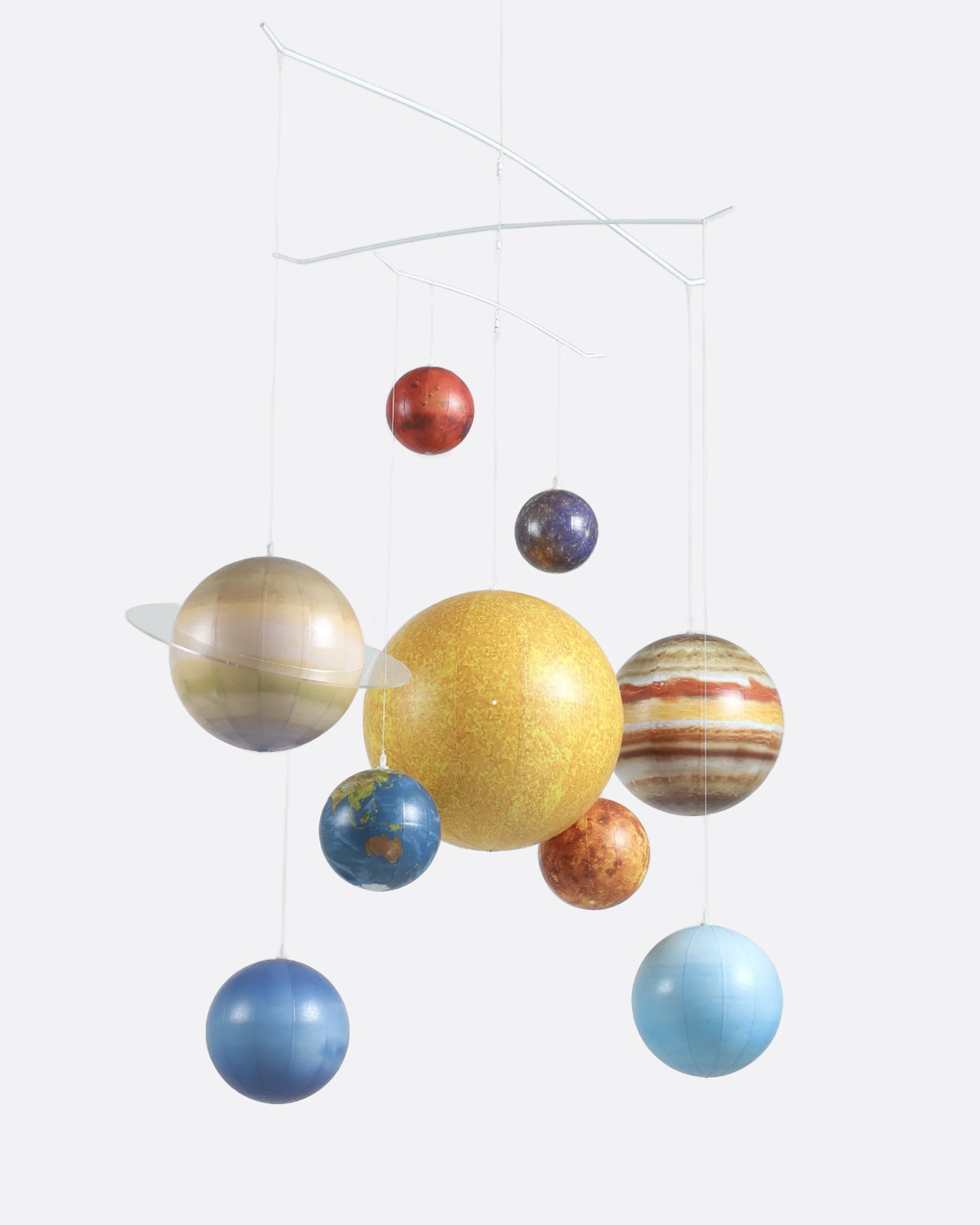 A hanging mobile with each of the planets and the sun in our solar system.