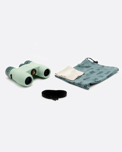 Pale blue compact binoculars, shown with the strap and pouch