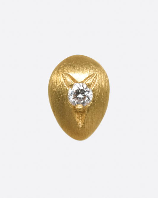 This brushed gold earring is smooth and rounded like a real drop of water.