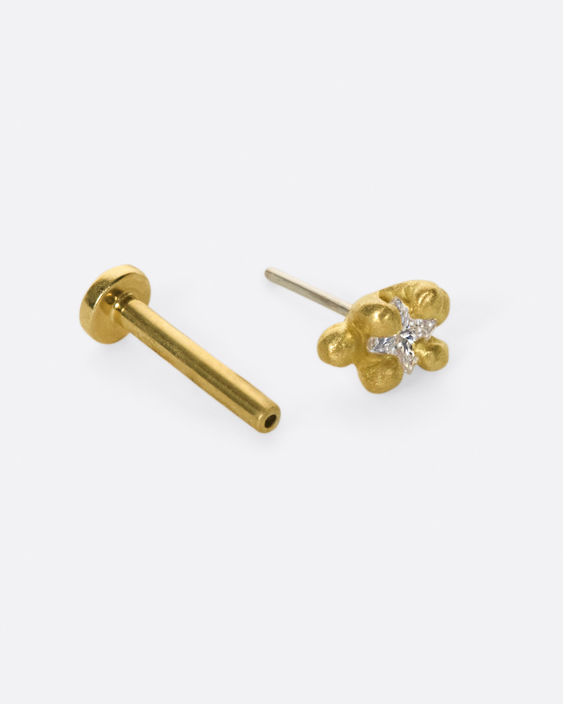 This solitaire stud's matte gold prongs make it more substantial, while remaining soft looking.