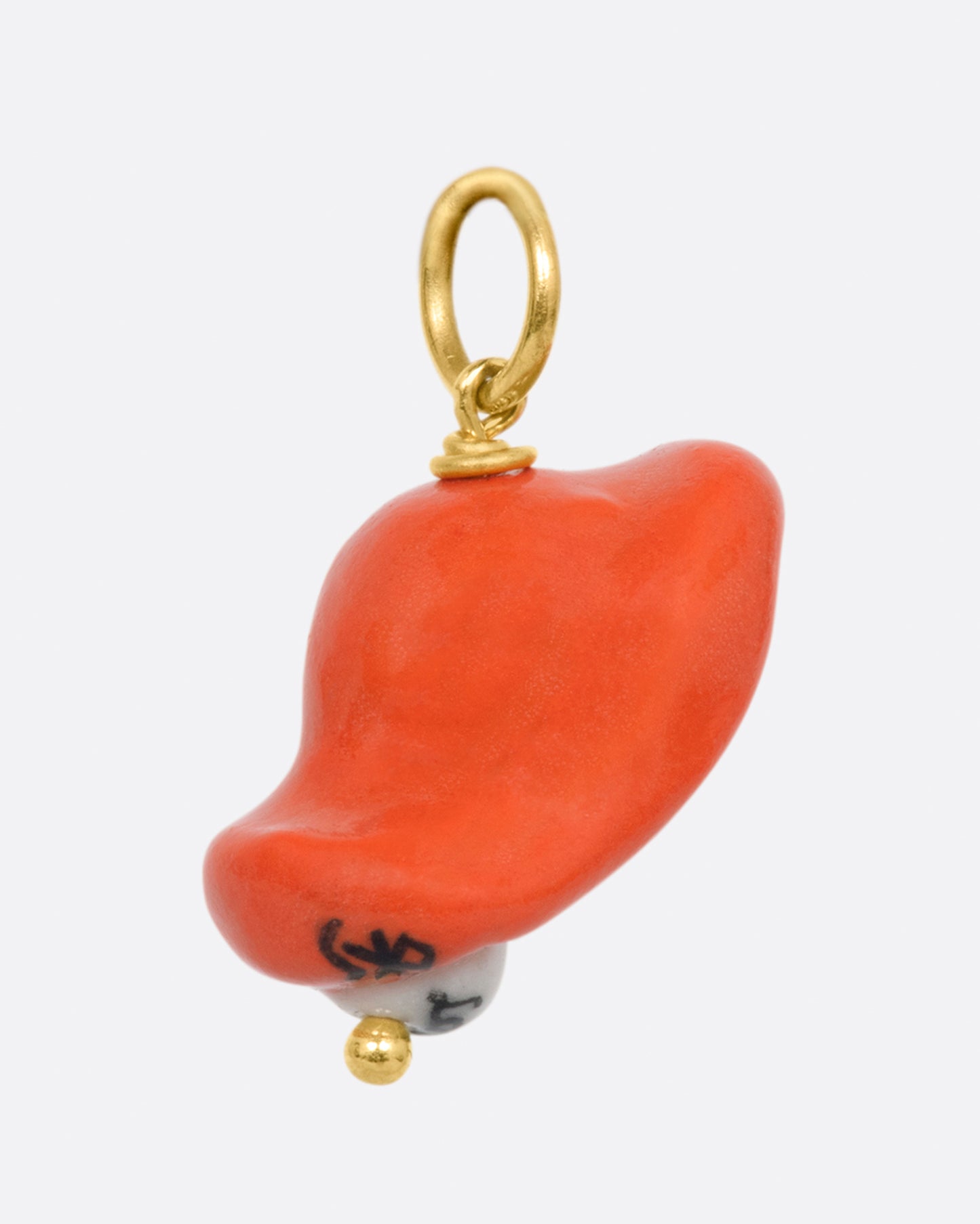 A handmade porcelain charm in the 3D shape of Jessica Rabbit with a yellow gold bail.