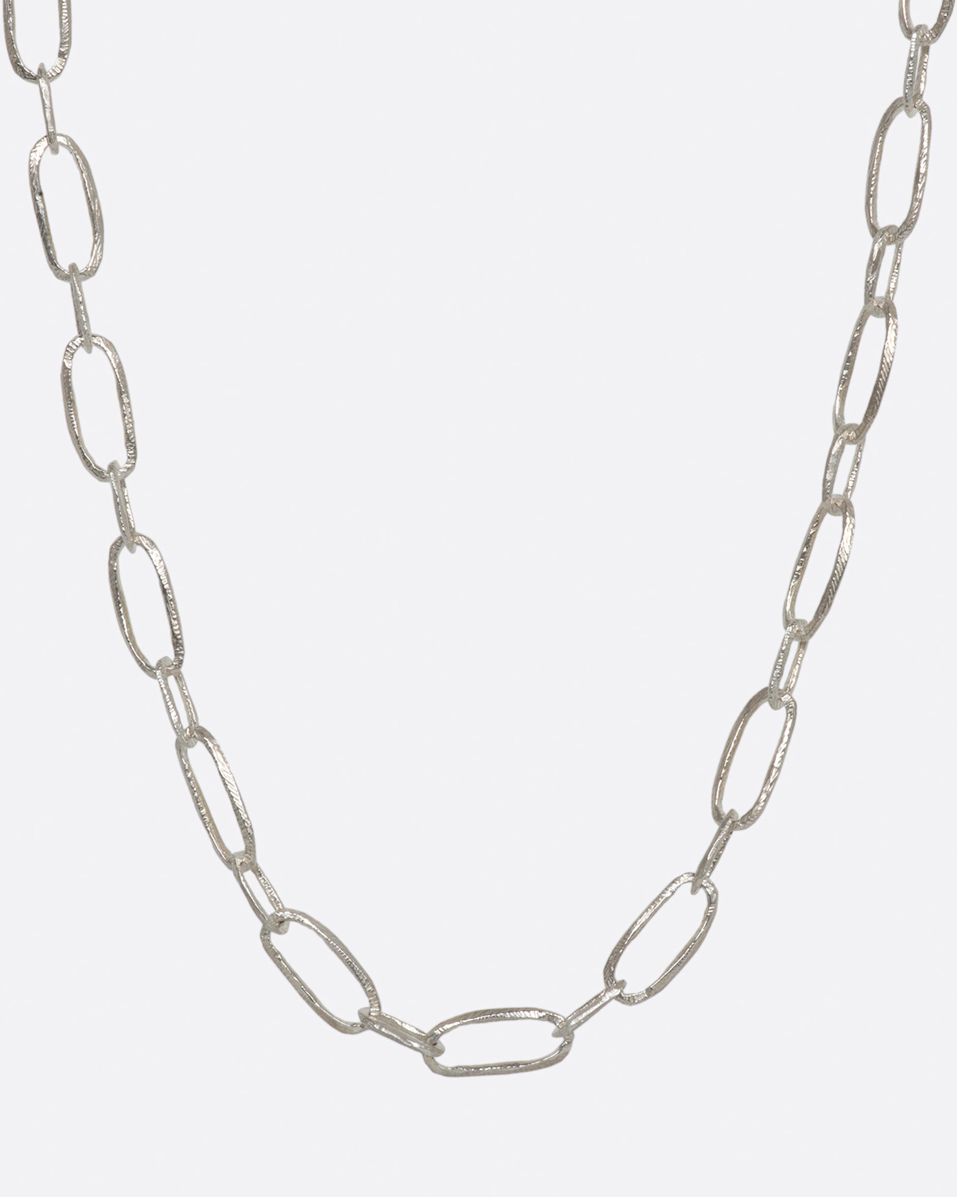 Textured sterling silver chain. View from the front.