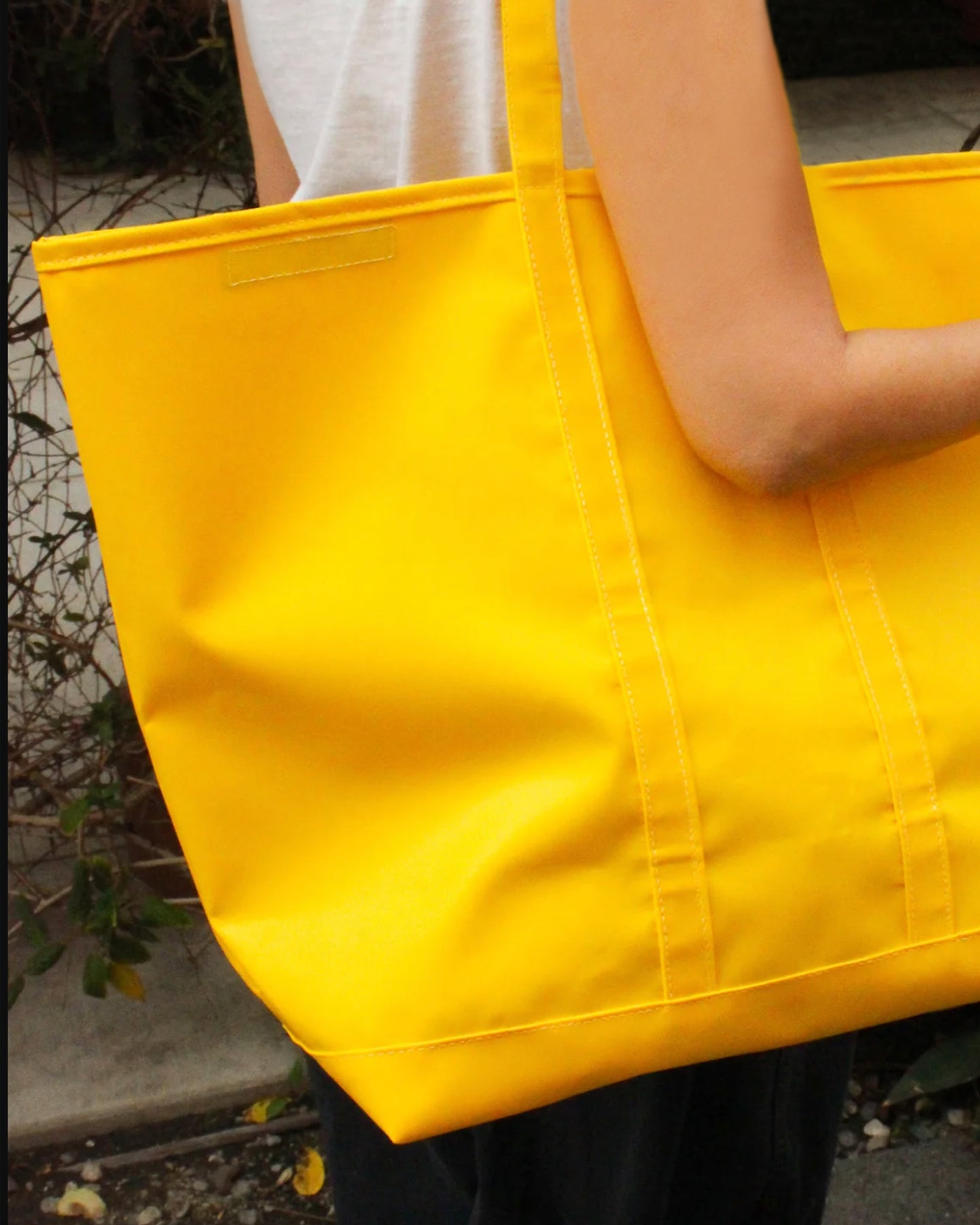 This large tarp bag is made from the same material that trucks use to protect their cargo and this yellow color means you'll never lose it.