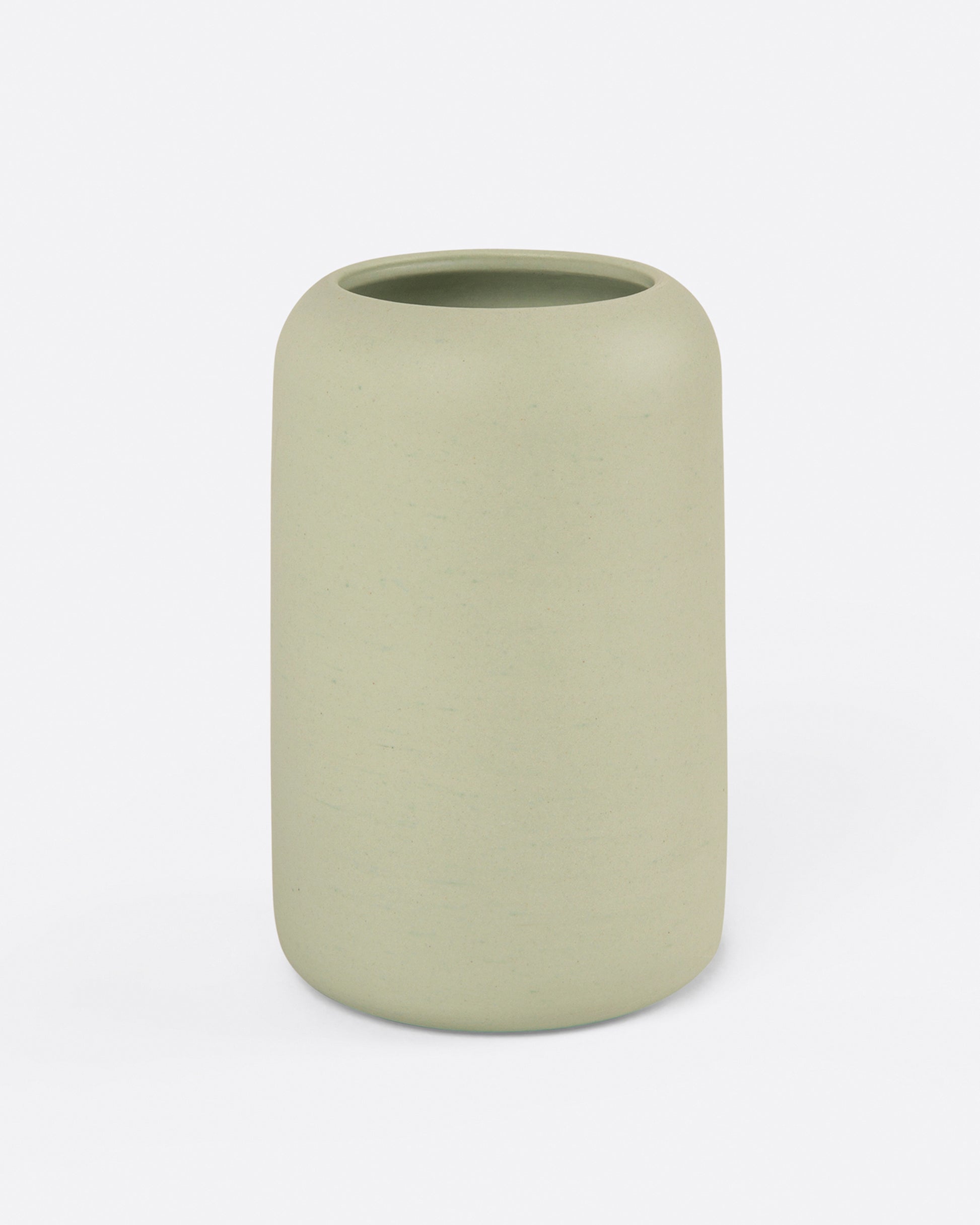 A green porcelain vase, shown from the side.