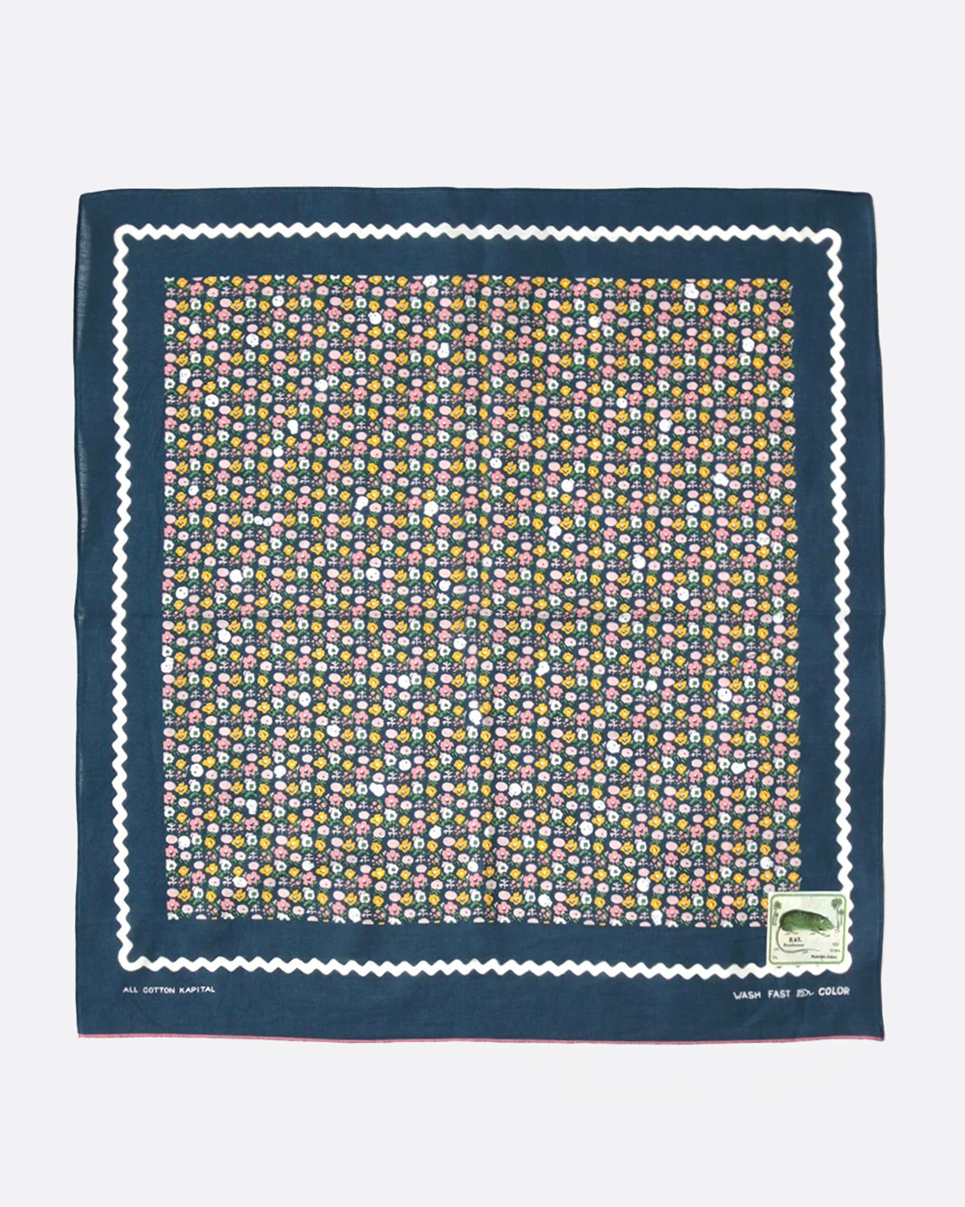 A navy blue bandana with a ditsy floral print and tiny skulls throughout, shown from the front.