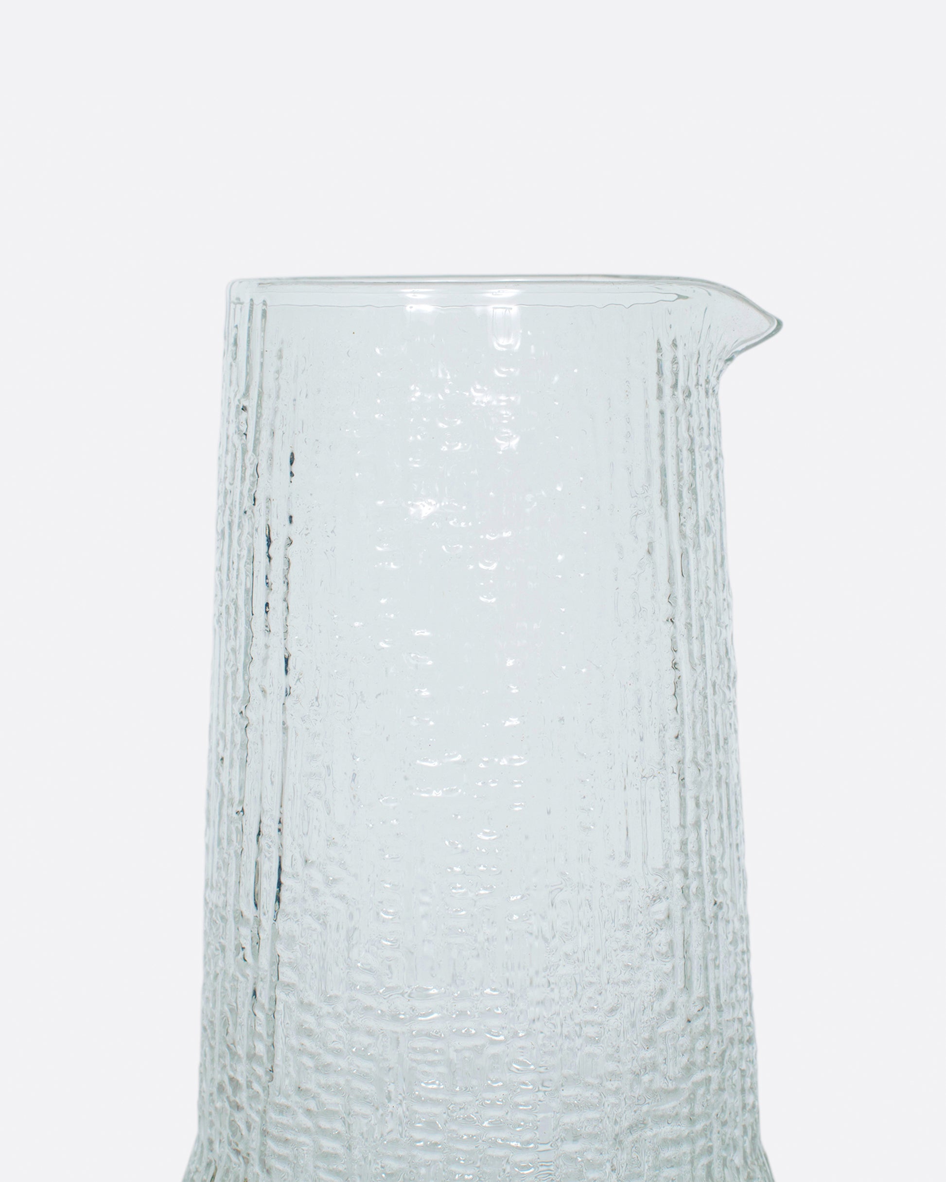 This mid-century, beaker-like piece can be used as a carafe or a vase.