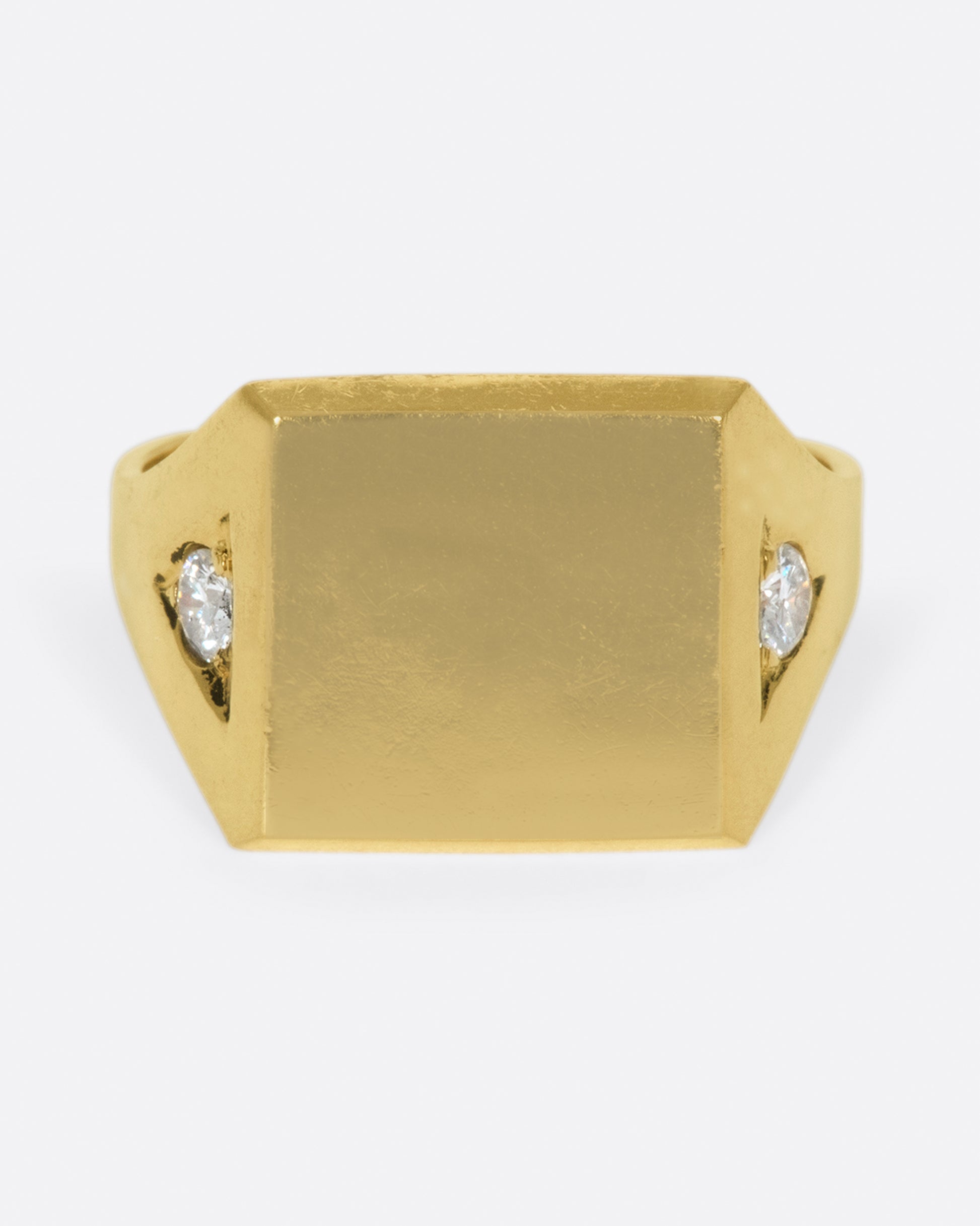 This blank signet is just as cool as is, with its diamond accents, as it would be with your or a loved one's initials.