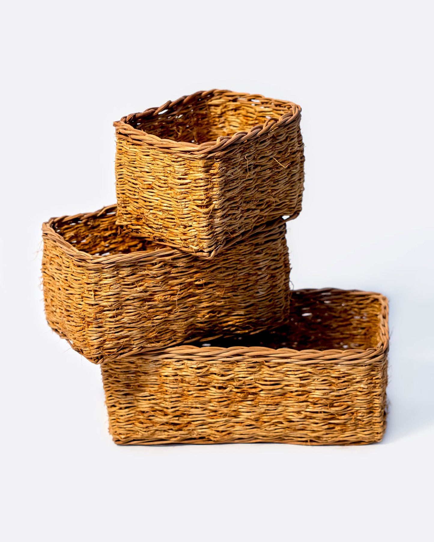 Stack of all three sizes of the vetiver baskets.