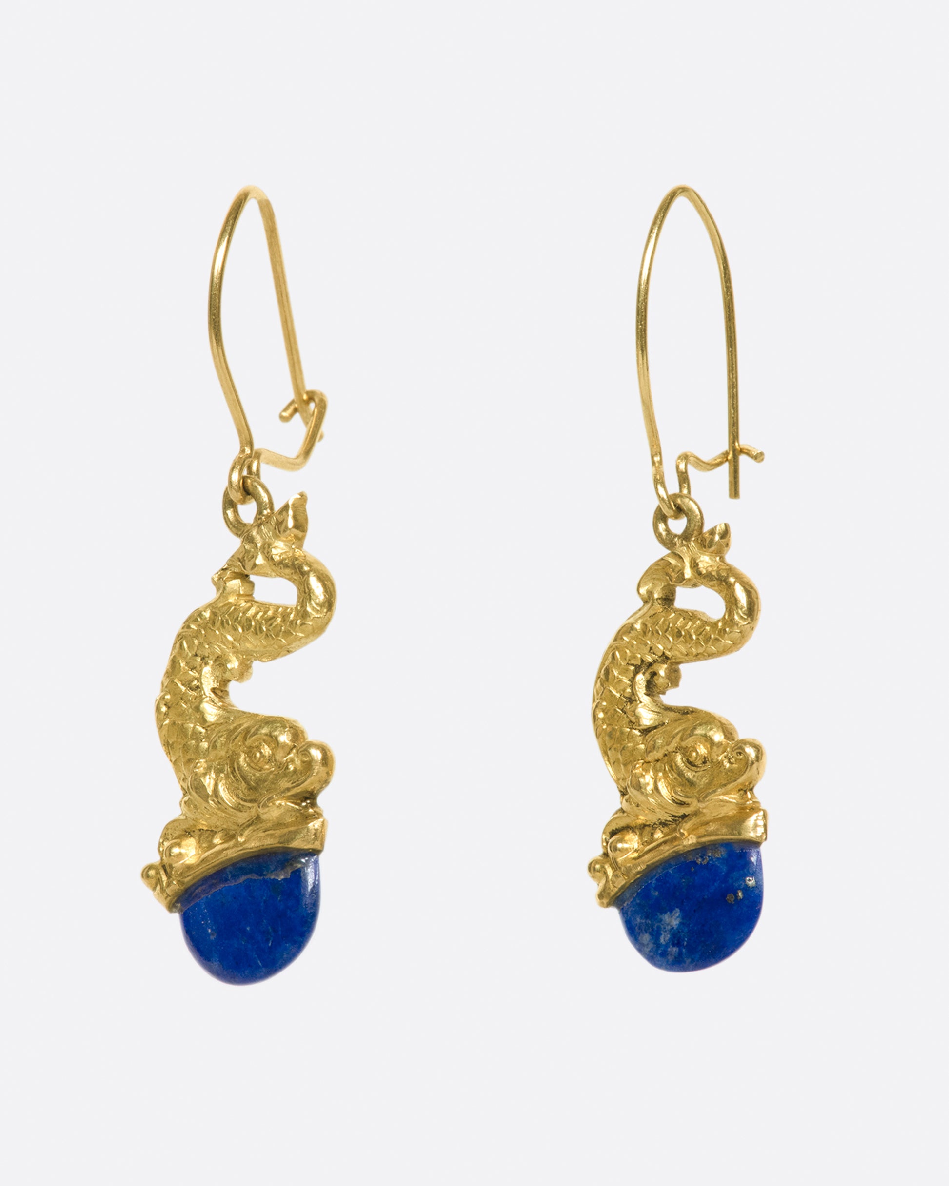 A pair of lucky gold koi; symbolic of strength, patience, and prosperity.