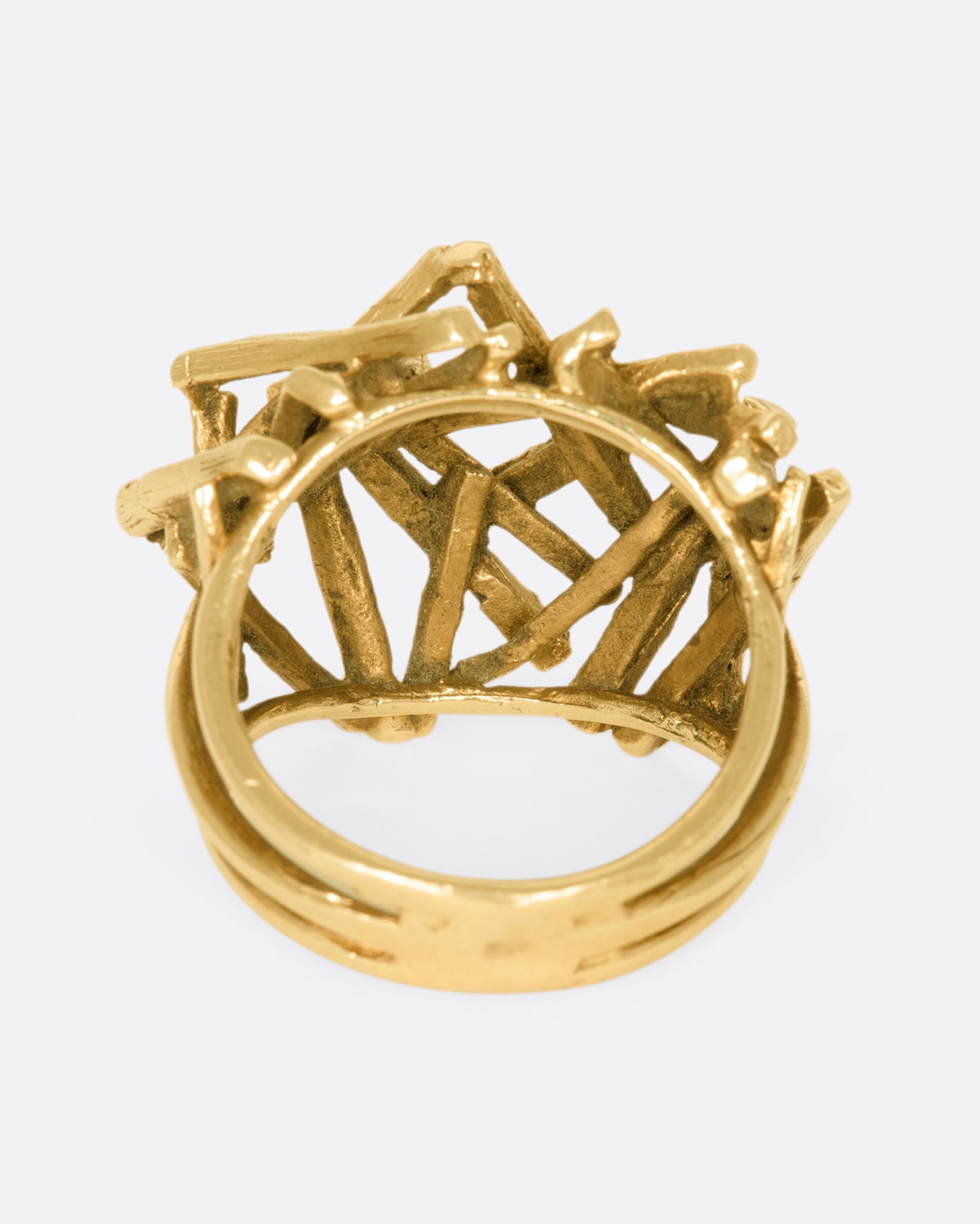 A vintage 15k gold pile of sticks ring that sits high above your finger in an incredible 3D dome