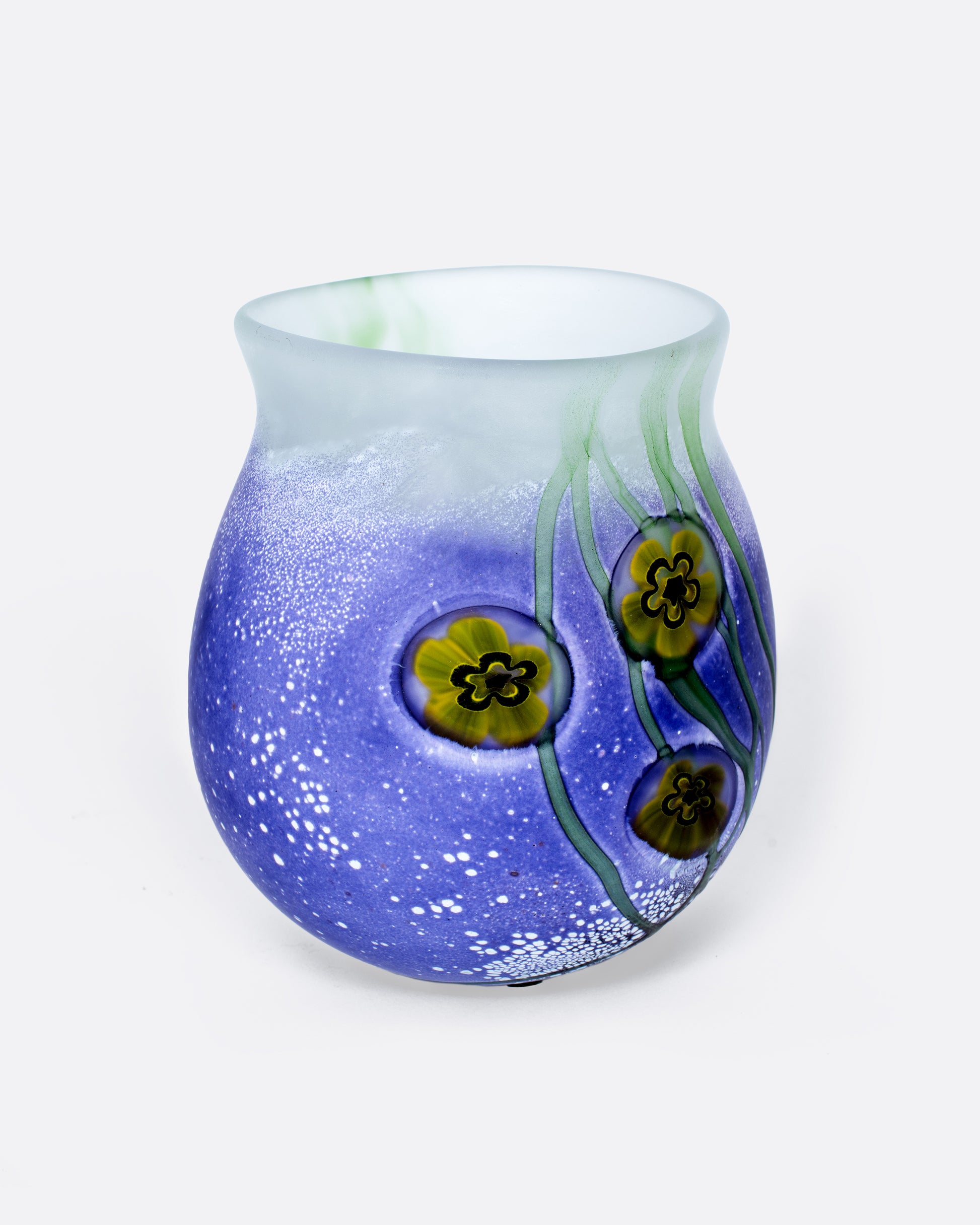 This heavy, frosted glass vase is mesmerizing from every angle.