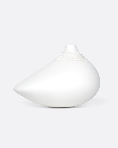 Vintage white porcelain bud vase, side view from the other end