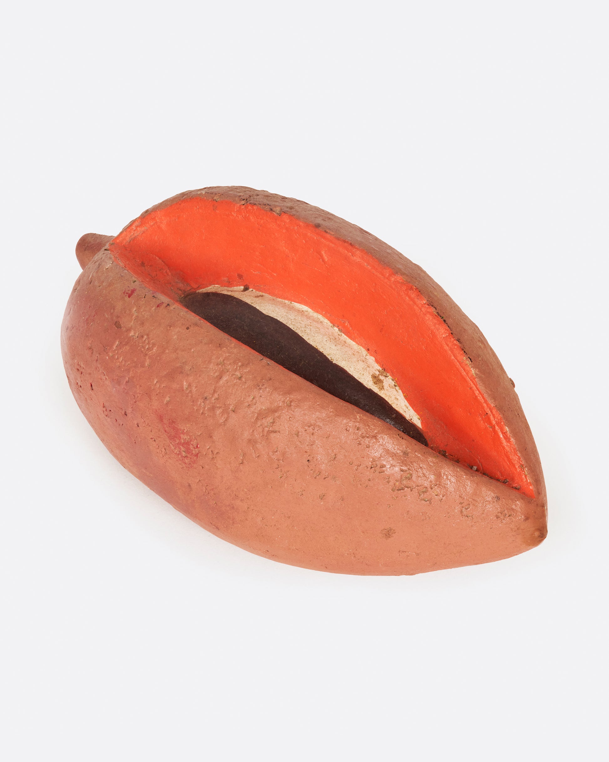 A vintage handmade sapote fruit bank from 1940's Mexico.