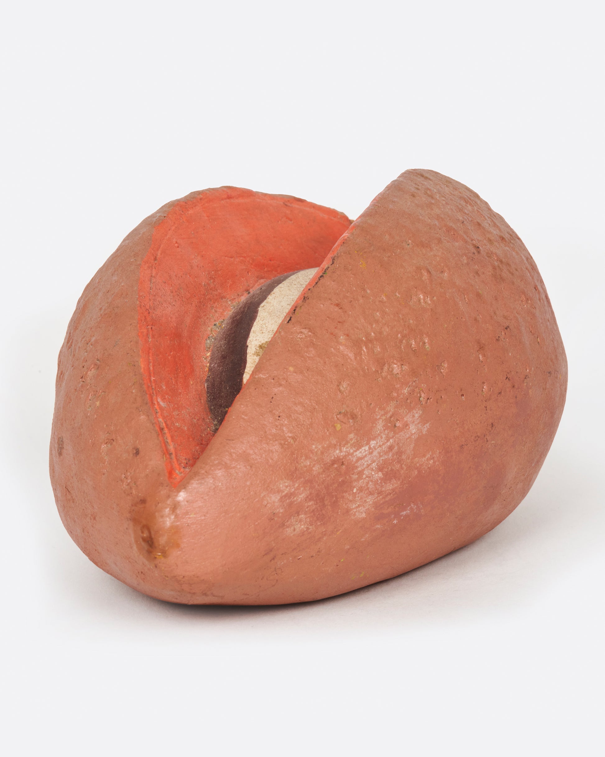 A vintage handmade sapote bank from 1940's Mexico.