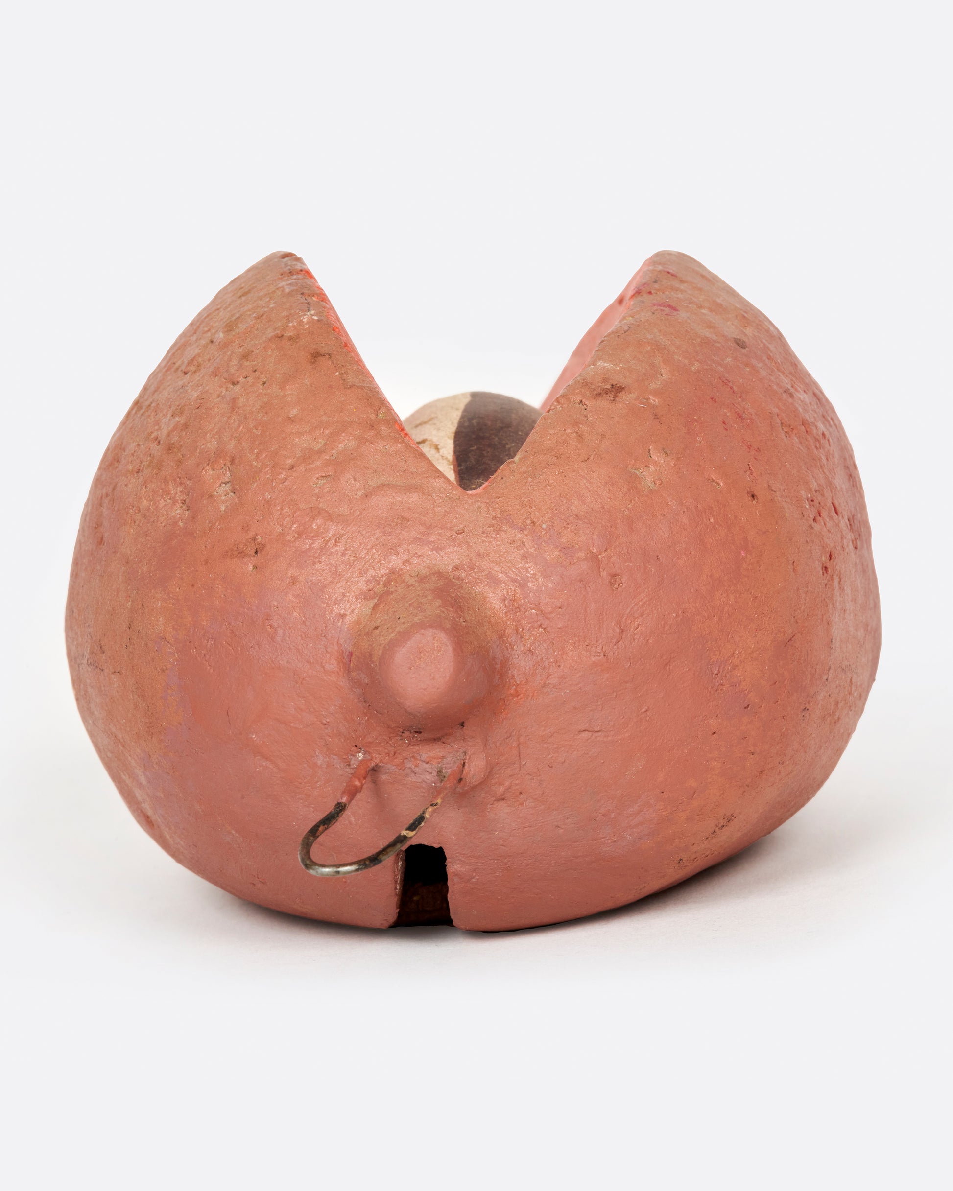 A vintage handmade sapote bank from 1940's Mexico.