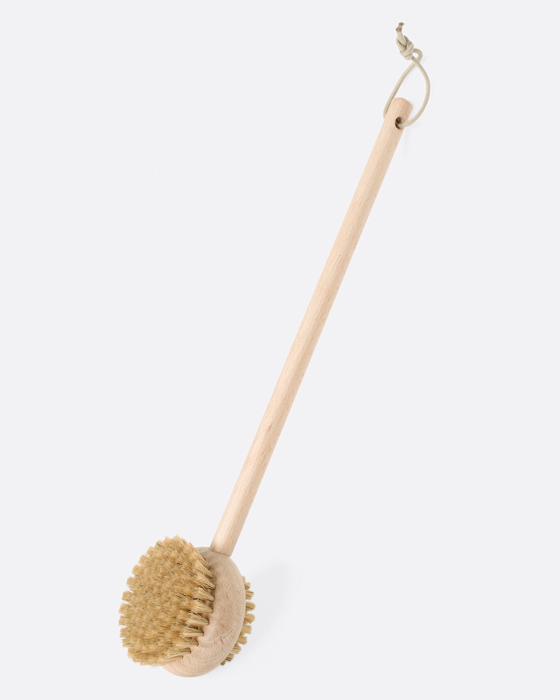 A round beechwood body brush with bristles on both sides, shown from the side.