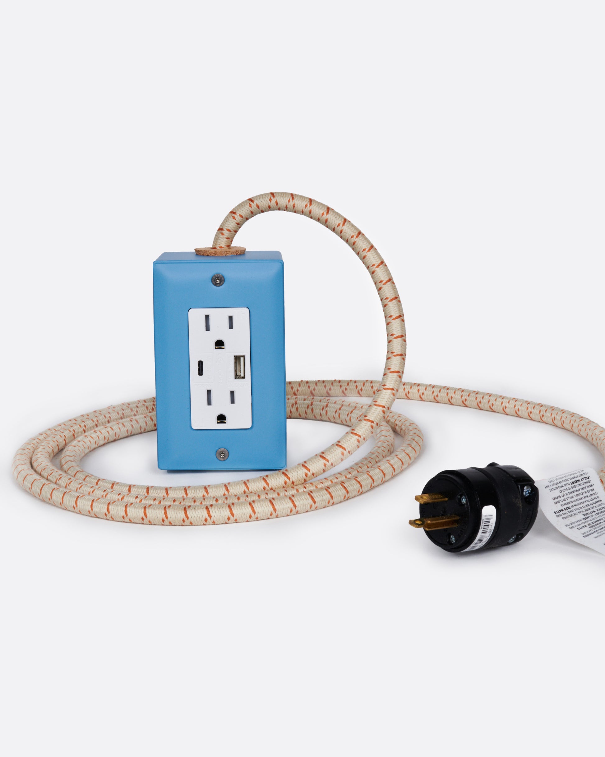 A handmade extension cord that utilizes smart USB and USB C technology to charge your device faster by identifying it and sending it a matching charge.