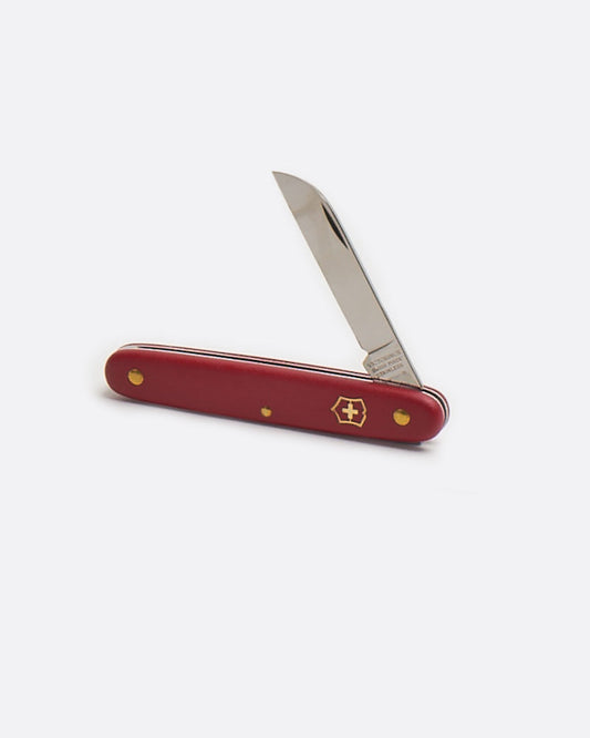 Victorinox floral knife with red handle, shown open